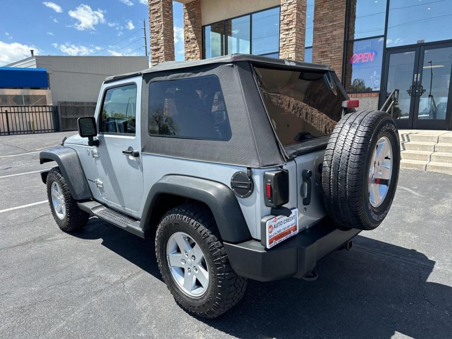 2011 Bright Silver Metallic Clearcoat /Black Interior Jeep Wrangler Sport (1J4GA2D13BL) with an 3.8L V6 SMPI engine, Automatic transmission, located at 8595 Washington St., Thornton, CO, 80229, (303) 287-5511, 39.852348, -104.978447 - 2011 Jeep Wrangler Automatic in Excellent Condition! <br><br>All Cars Have Clean Titles And Are Serviced Before Sale., Clean Carfax, No Accident, Non Smoker, No Pet Odor Or Hair, 4-Speed Automatic, 4WD.<br><br>D1 Auto NEVER charges dealer fees! All cars have clean titles and have been inspected for - Photo#7