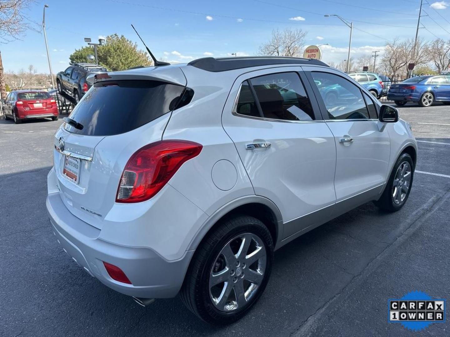 2014 White Pearl Tricoat /Ebony Buick Encore Leather (KL4CJCSB2EB) with an ECOTEC 1.4L I4 SMPI DOHC Turbocharged VVT engine, Automatic transmission, located at 8595 Washington St., Thornton, CO, 80229, (303) 287-5511, 39.852348, -104.978447 - 2014 Buick Encore<br>All Cars Have Clean Titles And Are Serviced Before Sale., CarfaxOne Owner, No Accidents, Blind Spot Monitoring, Backup Camera, Leather, Heated Seats, Bluetooth/ With Bluetooth Audio, Power Seats, Non Smoker, No Pet Odor Or Hair, FWD.<br>D1 Auto NEVER charges dealer fees! All car - Photo#5