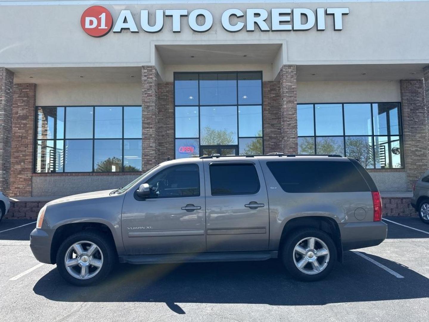 2013 Mocha Steel Metallic /Light Titanium GMC Yukon XL SLT 1500 (1GKS2KE78DR) with an Vortec 5.3L V8 SFI Flex Fuel engine, Automatic transmission, located at 8595 Washington St., Thornton, CO, 80229, (303) 287-5511, 39.852348, -104.978447 - 2013 GMC Yukon XL<br><br>D1 Auto NEVER charges dealer fees! All cars have clean titles and have been inspected for mechanical issues. We have financing for everyone. Good credit, bad credit, first time buyers.<br><br>Please call Lakewood Location 303-274-7692 or Thornton 303-287-5511 to schedule a t - Photo#0