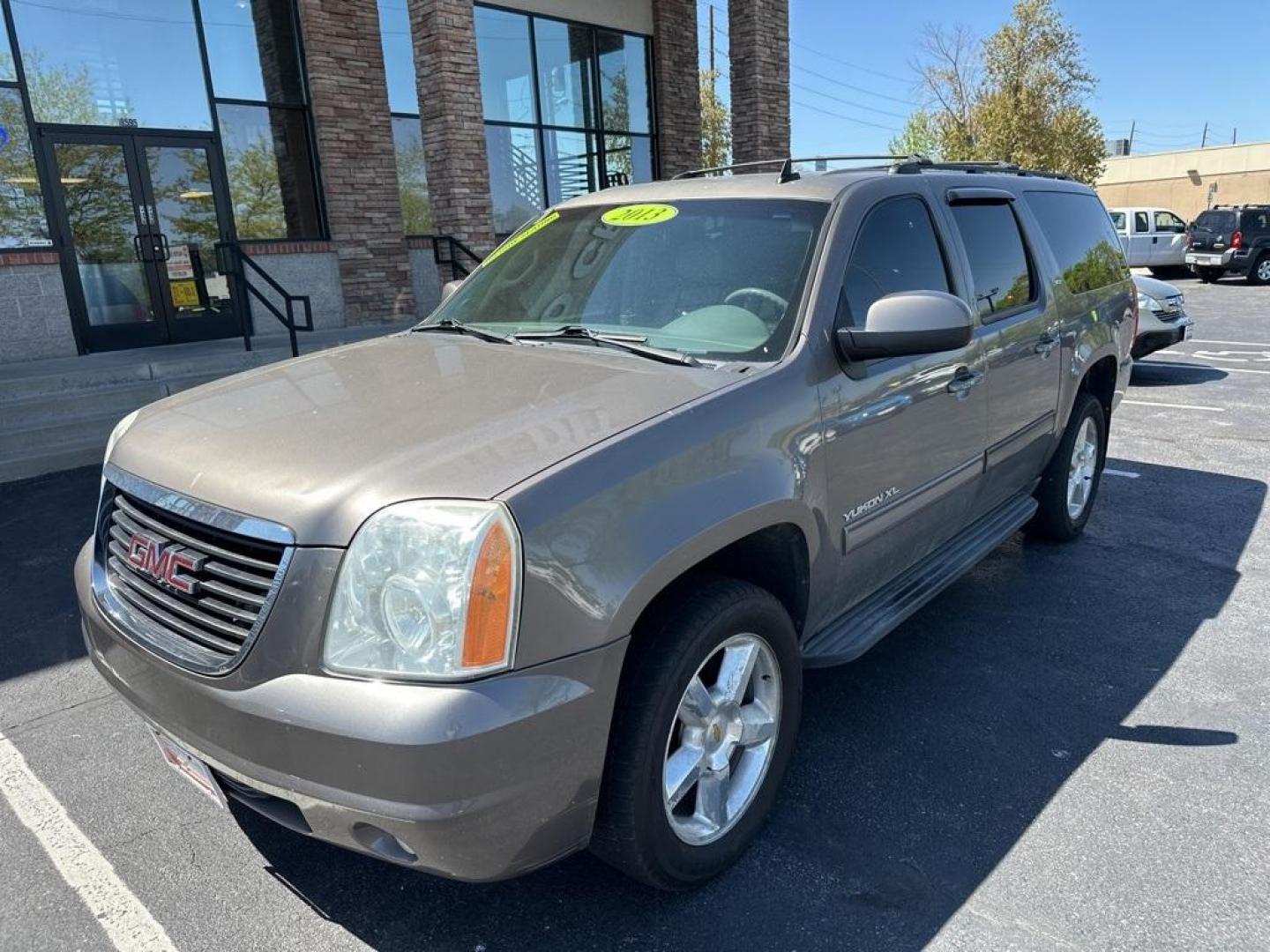 2013 Mocha Steel Metallic /Light Titanium GMC Yukon XL SLT 1500 (1GKS2KE78DR) with an Vortec 5.3L V8 SFI Flex Fuel engine, Automatic transmission, located at 8595 Washington St., Thornton, CO, 80229, (303) 287-5511, 39.852348, -104.978447 - 2013 GMC Yukon XL<br><br>D1 Auto NEVER charges dealer fees! All cars have clean titles and have been inspected for mechanical issues. We have financing for everyone. Good credit, bad credit, first time buyers.<br><br>Please call Lakewood Location 303-274-7692 or Thornton 303-287-5511 to schedule a t - Photo#1