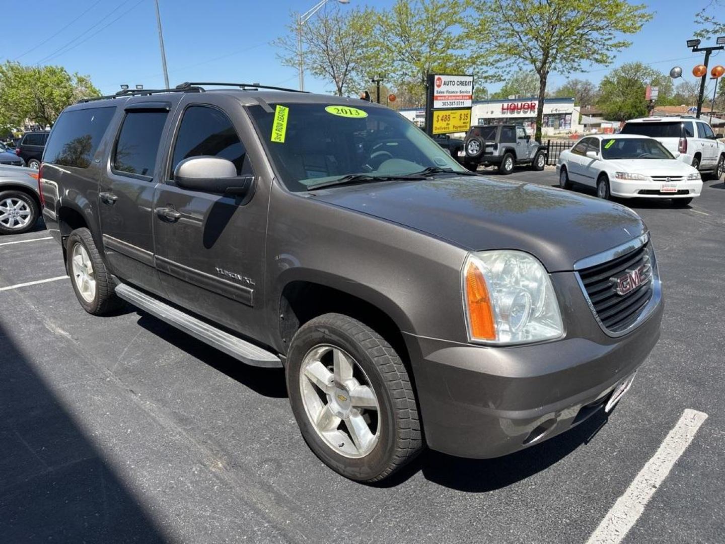 2013 Mocha Steel Metallic /Light Titanium GMC Yukon XL SLT 1500 (1GKS2KE78DR) with an Vortec 5.3L V8 SFI Flex Fuel engine, Automatic transmission, located at 8595 Washington St., Thornton, CO, 80229, (303) 287-5511, 39.852348, -104.978447 - 2013 GMC Yukon XL<br><br>D1 Auto NEVER charges dealer fees! All cars have clean titles and have been inspected for mechanical issues. We have financing for everyone. Good credit, bad credit, first time buyers.<br><br>Please call Lakewood Location 303-274-7692 or Thornton 303-287-5511 to schedule a t - Photo#5