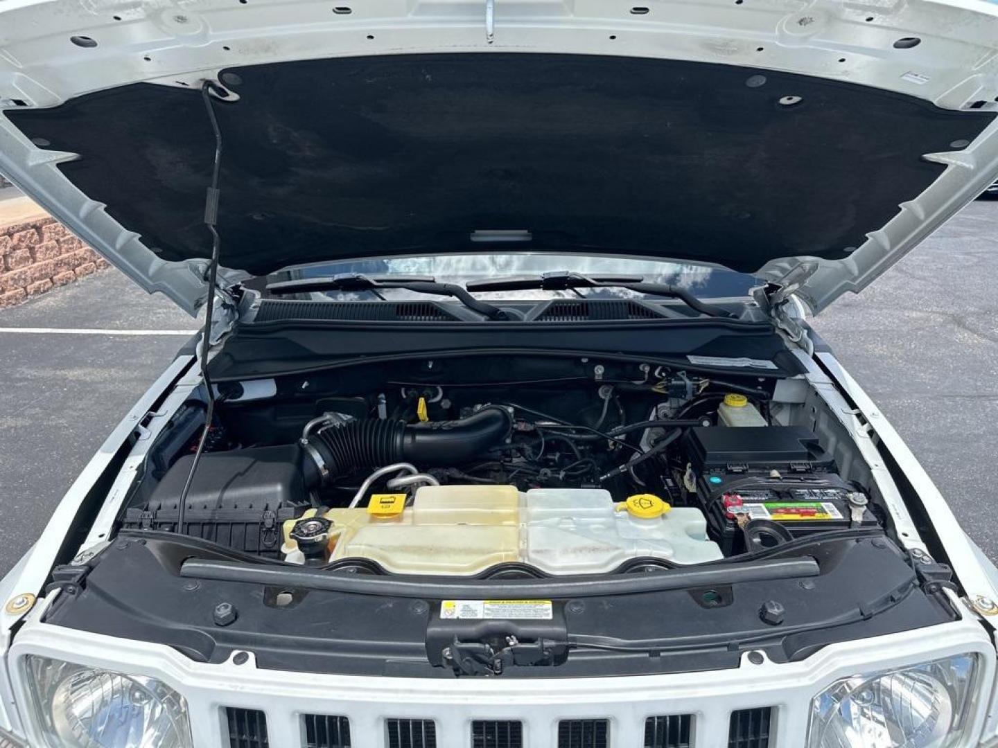 2012 Bright White Clearcoat /Dark Slate Gray Interior Jeep Liberty Sport (1C4PJMAK0CW) with an PowerTech 3.7L V6 engine, Automatic transmission, located at 8595 Washington St., Thornton, CO, 80229, (303) 287-5511, 39.852348, -104.978447 - 2012 Jeep Liberty<br><br>D1 Auto NEVER charges dealer fees! All cars have clean titles and have been inspected for mechanical issues. We have financing for everyone. Good credit, bad credit, first time buyers.<br><br>Please call Lakewood Location 303-274-7692 or Thornton 303-287-5511 to schedule a t - Photo#27