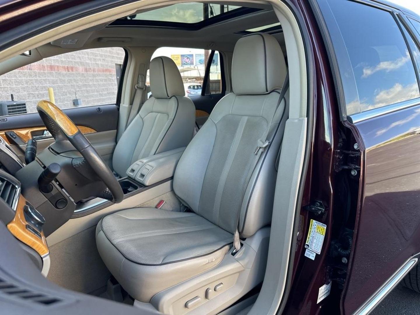 2011 Burgundy /Light Stone/Medium Light Stone Lincoln MKX Base (2LMDJ8JK9BB) with an 3.7L V6 Ti-VCT 24V engine, Automatic transmission, located at 8595 Washington St., Thornton, CO, 80229, (303) 287-5511, 39.852348, -104.978447 - 2011 Lincoln MKX One Owner and fully loaded! <br><br>All Cars Have Clean Titles And Are Serviced Before Sale., CarfaxOne Owner, No Accidents, All Books and Keys, Backup Camera, Leather, Heated and Ventilated Seats, Bluetooth/ With Bluetooth Audio, Power Seats, Non Smoker, No Pet Odor Or Hair, 3.7L V - Photo#13