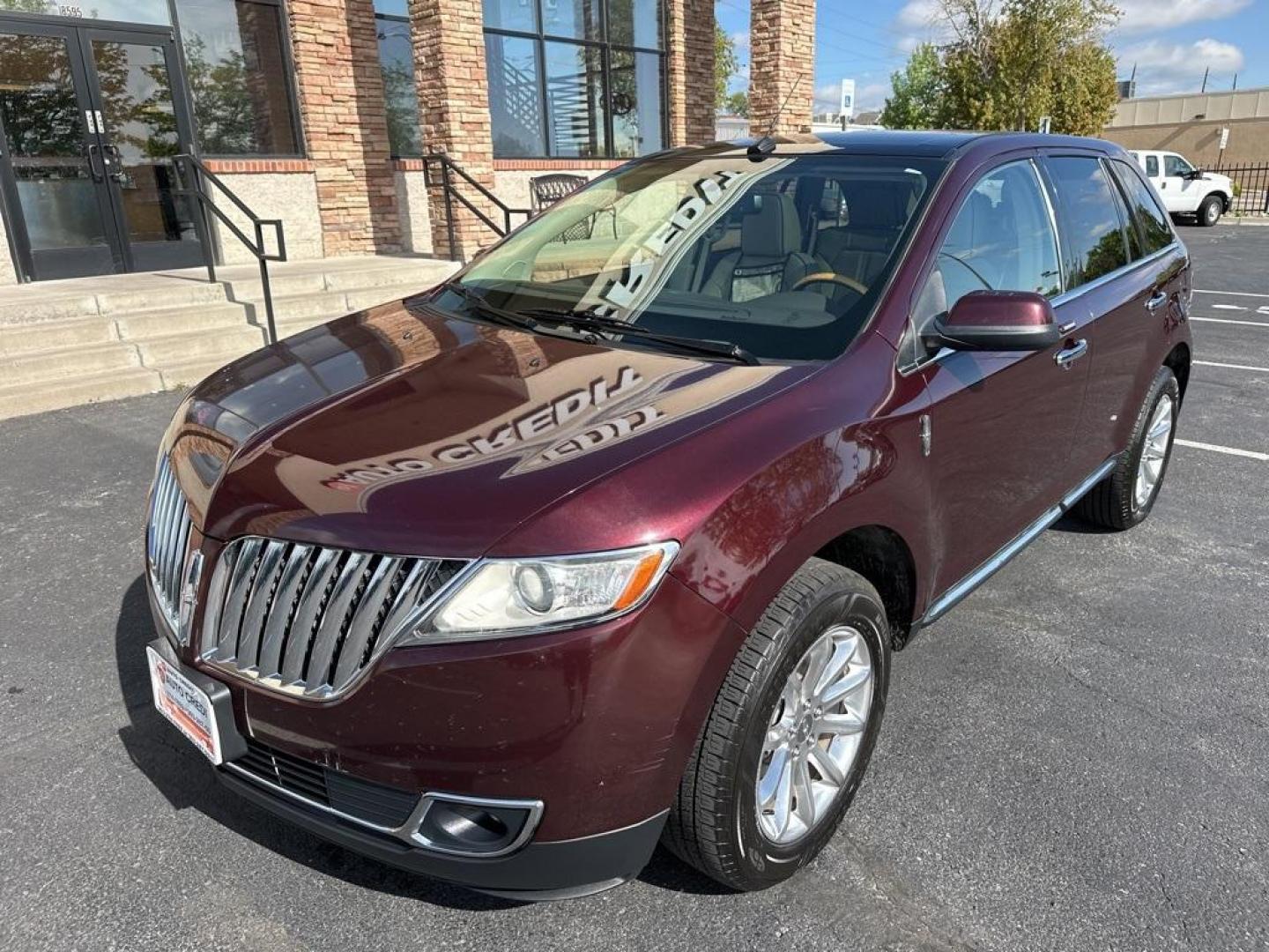 2011 Burgundy /Light Stone/Medium Light Stone Lincoln MKX Base (2LMDJ8JK9BB) with an 3.7L V6 Ti-VCT 24V engine, Automatic transmission, located at 8595 Washington St., Thornton, CO, 80229, (303) 287-5511, 39.852348, -104.978447 - 2011 Lincoln MKX One Owner and fully loaded! <br><br>All Cars Have Clean Titles And Are Serviced Before Sale., CarfaxOne Owner, No Accidents, All Books and Keys, Backup Camera, Leather, Heated and Ventilated Seats, Bluetooth/ With Bluetooth Audio, Power Seats, Non Smoker, No Pet Odor Or Hair, 3.7L V - Photo#1