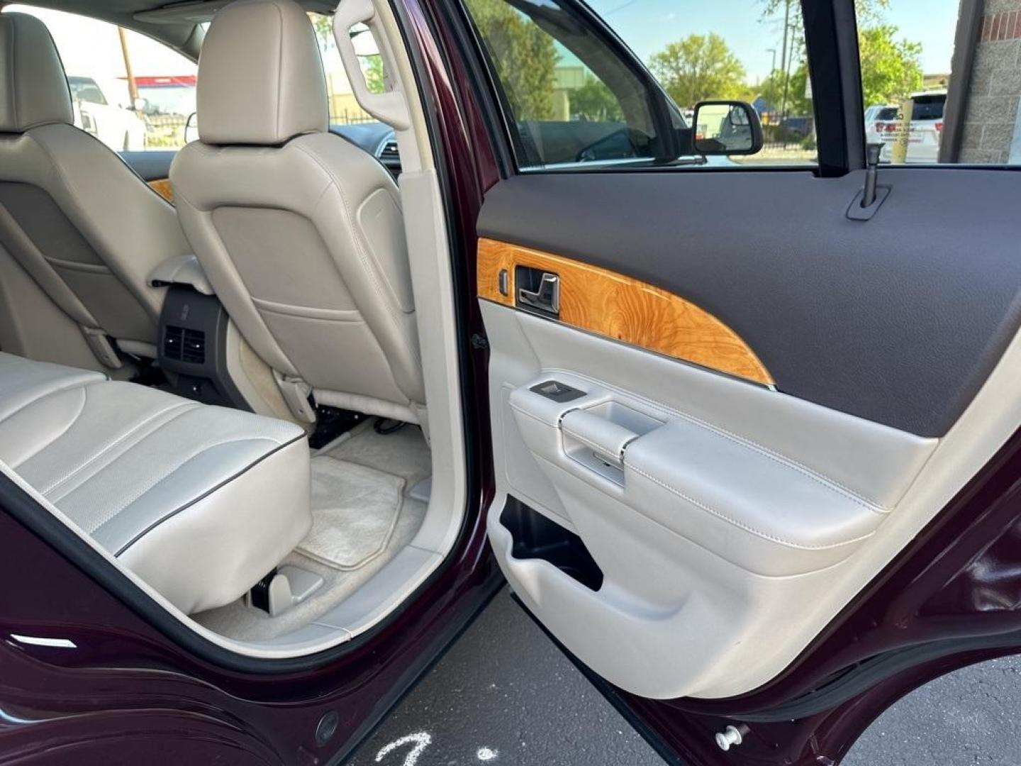 2011 Burgundy /Light Stone/Medium Light Stone Lincoln MKX Base (2LMDJ8JK9BB) with an 3.7L V6 Ti-VCT 24V engine, Automatic transmission, located at 8595 Washington St., Thornton, CO, 80229, (303) 287-5511, 39.852348, -104.978447 - 2011 Lincoln MKX One Owner and fully loaded! <br><br>All Cars Have Clean Titles And Are Serviced Before Sale., CarfaxOne Owner, No Accidents, All Books and Keys, Backup Camera, Leather, Heated and Ventilated Seats, Bluetooth/ With Bluetooth Audio, Power Seats, Non Smoker, No Pet Odor Or Hair, 3.7L V - Photo#21