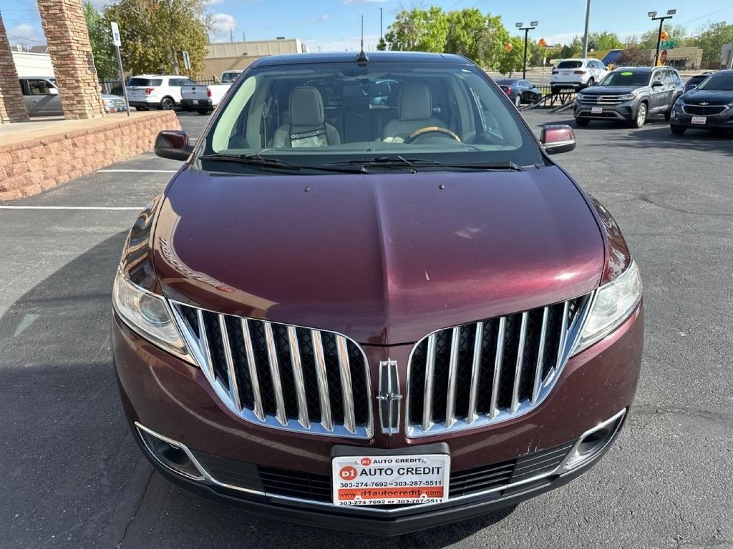 2011 Burgundy /Light Stone/Medium Light Stone Lincoln MKX Base (2LMDJ8JK9BB) with an 3.7L V6 Ti-VCT 24V engine, Automatic transmission, located at 8595 Washington St., Thornton, CO, 80229, (303) 287-5511, 39.852348, -104.978447 - 2011 Lincoln MKX One Owner and fully loaded! <br><br>All Cars Have Clean Titles And Are Serviced Before Sale., CarfaxOne Owner, No Accidents, All Books and Keys, Backup Camera, Leather, Heated and Ventilated Seats, Bluetooth/ With Bluetooth Audio, Power Seats, Non Smoker, No Pet Odor Or Hair, 3.7L V - Photo#2