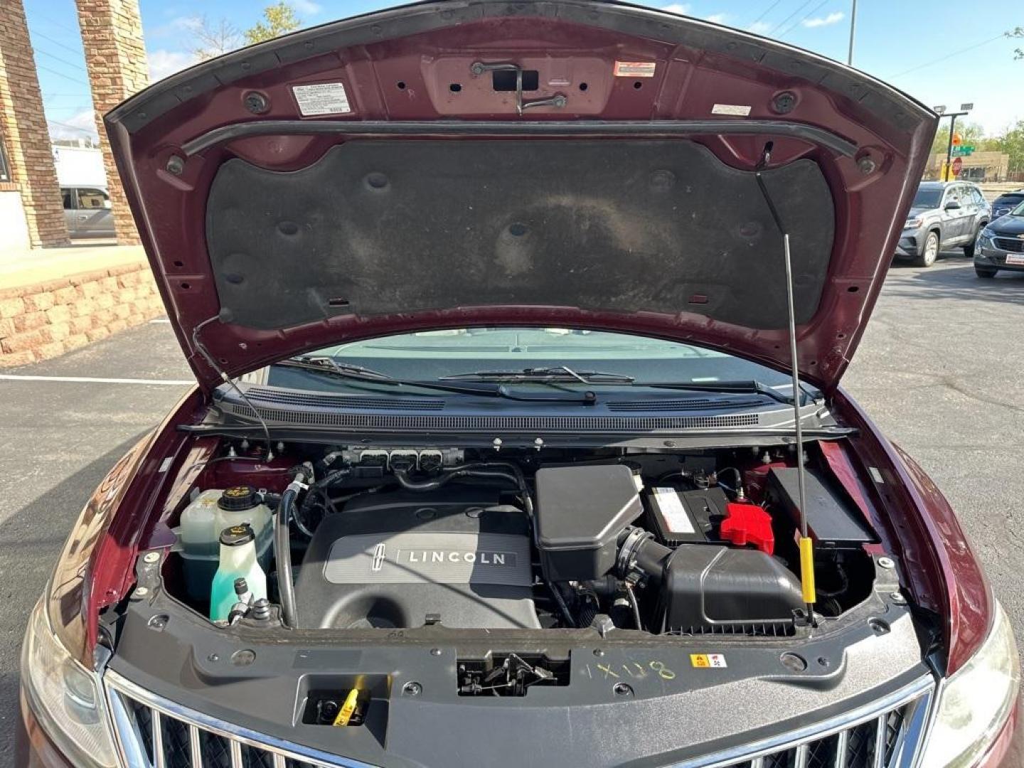 2011 Burgundy /Light Stone/Medium Light Stone Lincoln MKX Base (2LMDJ8JK9BB) with an 3.7L V6 Ti-VCT 24V engine, Automatic transmission, located at 8595 Washington St., Thornton, CO, 80229, (303) 287-5511, 39.852348, -104.978447 - 2011 Lincoln MKX One Owner and fully loaded! <br><br>All Cars Have Clean Titles And Are Serviced Before Sale., CarfaxOne Owner, No Accidents, All Books and Keys, Backup Camera, Leather, Heated and Ventilated Seats, Bluetooth/ With Bluetooth Audio, Power Seats, Non Smoker, No Pet Odor Or Hair, 3.7L V - Photo#35