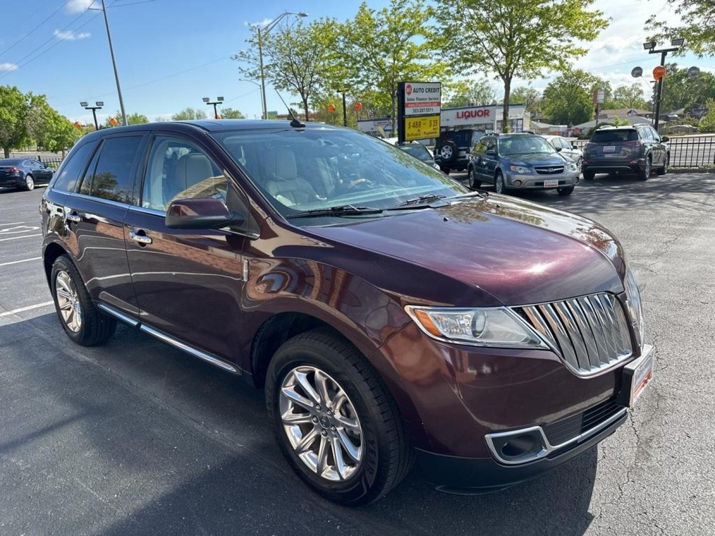 2011 Burgundy /Light Stone/Medium Light Stone Lincoln MKX Base (2LMDJ8JK9BB) with an 3.7L V6 Ti-VCT 24V engine, Automatic transmission, located at 8595 Washington St., Thornton, CO, 80229, (303) 287-5511, 39.852348, -104.978447 - 2011 Lincoln MKX One Owner and fully loaded! <br><br>All Cars Have Clean Titles And Are Serviced Before Sale., CarfaxOne Owner, No Accidents, All Books and Keys, Backup Camera, Leather, Heated and Ventilated Seats, Bluetooth/ With Bluetooth Audio, Power Seats, Non Smoker, No Pet Odor Or Hair, 3.7L V - Photo#3