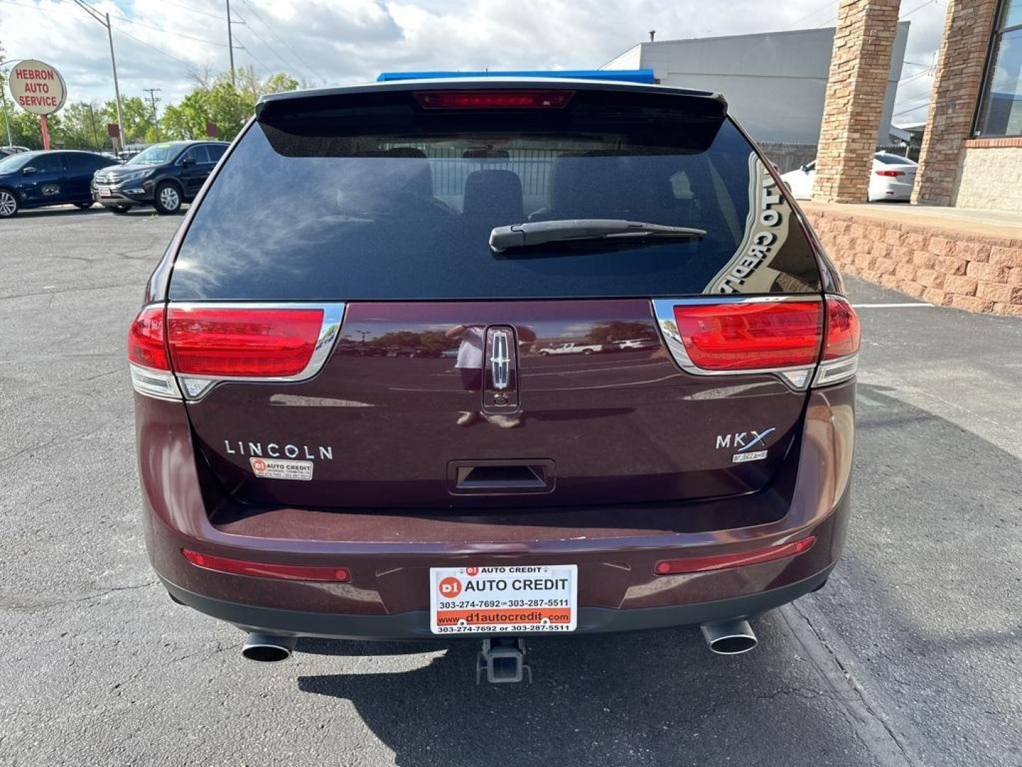 2011 Burgundy /Light Stone/Medium Light Stone Lincoln MKX Base (2LMDJ8JK9BB) with an 3.7L V6 Ti-VCT 24V engine, Automatic transmission, located at 8595 Washington St., Thornton, CO, 80229, (303) 287-5511, 39.852348, -104.978447 - 2011 Lincoln MKX One Owner and fully loaded! <br><br>All Cars Have Clean Titles And Are Serviced Before Sale., CarfaxOne Owner, No Accidents, All Books and Keys, Backup Camera, Leather, Heated and Ventilated Seats, Bluetooth/ With Bluetooth Audio, Power Seats, Non Smoker, No Pet Odor Or Hair, 3.7L V - Photo#6