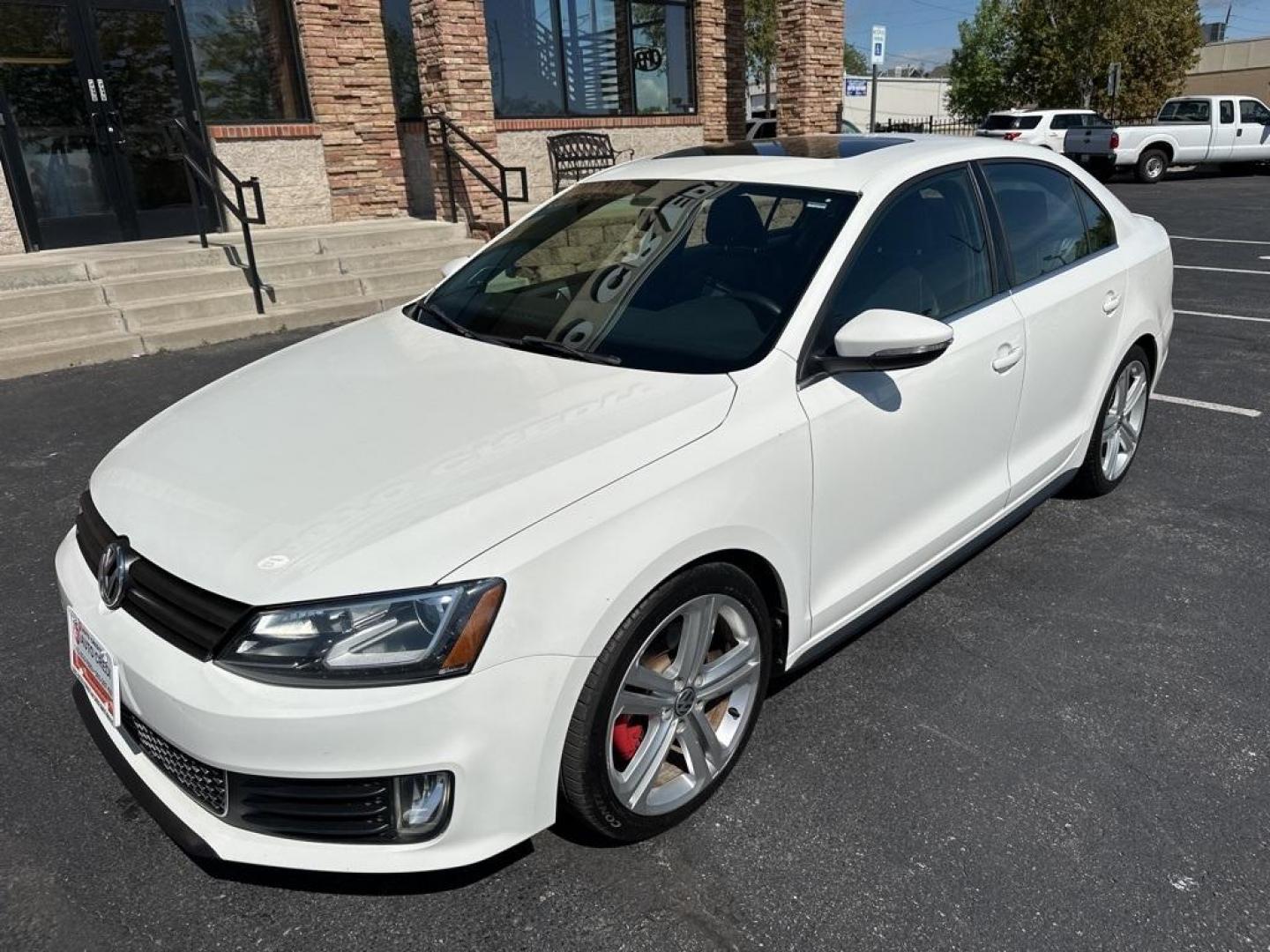 2013 Candy White /Titan Black Volkswagen Jetta GLI (3VW5A7AJ0DM) with an 2.0L TSI DOHC engine, Manual transmission, located at 8595 Washington St., Thornton, CO, 80229, (303) 287-5511, 39.852348, -104.978447 - 2013 Volkswagen Jetta GLI Manual Trasmission<br><br>All Cars Have Clean Titles And Are Serviced Before Sale., Clean Carfax, No Accident, Backup Camera, Leather, Heated Seats, Bluetooth/ With Bluetooth Audio, Non Smoker, No Pet Odor Or Hair, Jetta GLI, 6-Speed Manual, Navigation System, Power moonroo - Photo#1