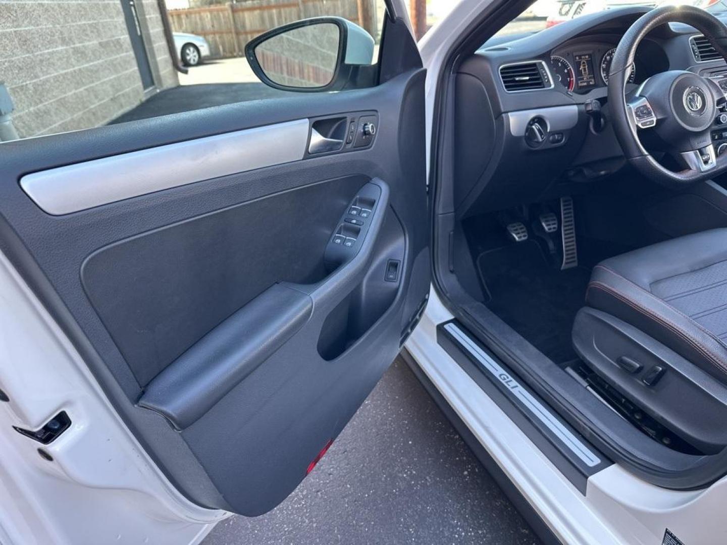 2013 Candy White /Titan Black Volkswagen Jetta GLI (3VW5A7AJ0DM) with an 2.0L TSI DOHC engine, Manual transmission, located at 8595 Washington St., Thornton, CO, 80229, (303) 287-5511, 39.852348, -104.978447 - 2013 Volkswagen Jetta GLI Manual Trasmission<br><br>All Cars Have Clean Titles And Are Serviced Before Sale., Clean Carfax, No Accident, Backup Camera, Leather, Heated Seats, Bluetooth/ With Bluetooth Audio, Non Smoker, No Pet Odor Or Hair, Jetta GLI, 6-Speed Manual, Navigation System, Power moonroo - Photo#23