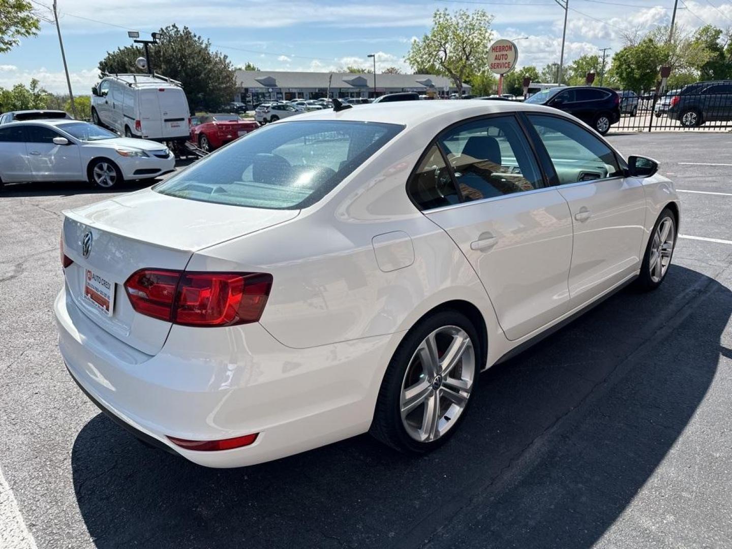 2013 Candy White /Titan Black Volkswagen Jetta GLI (3VW5A7AJ0DM) with an 2.0L TSI DOHC engine, Manual transmission, located at 8595 Washington St., Thornton, CO, 80229, (303) 287-5511, 39.852348, -104.978447 - 2013 Volkswagen Jetta GLI Manual Trasmission<br><br>All Cars Have Clean Titles And Are Serviced Before Sale., Clean Carfax, No Accident, Backup Camera, Leather, Heated Seats, Bluetooth/ With Bluetooth Audio, Non Smoker, No Pet Odor Or Hair, Jetta GLI, 6-Speed Manual, Navigation System, Power moonroo - Photo#6