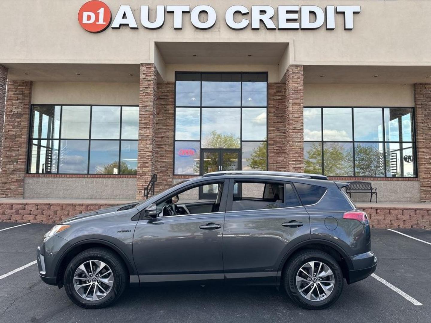 2017 Magnetic Gray Metallic /Black Toyota RAV4 Hybrid XLE (JTMRJREV0HD) with an 2.5L 4-Cylinder engine, CVT transmission, located at 8595 Washington St., Thornton, CO, 80229, (303) 287-5511, 39.852348, -104.978447 - 2017 Toyota RAV4 Hybrid<br><br>D1 Auto NEVER charges dealer fees! All cars have clean titles and have been inspected for mechanical issues. We have financing for everyone. Good credit, bad credit, first time buyers.<br>Odometer is 31713 miles below market average!<br>Please call Lakewood Location 30 - Photo#0