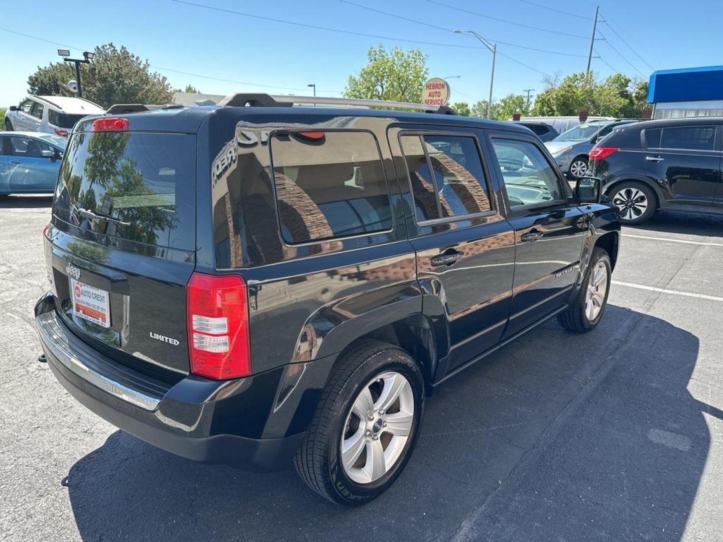 2012 Black Clearcoat /Dark Slate Gray Interior Jeep Patriot Limited (1C4NJRCB5CD) with an 2.4L I4 DOHC 16V Dual VVT engine, CVT transmission, located at 8595 Washington St., Thornton, CO, 80229, (303) 287-5511, 39.852348, -104.978447 - 2012 Jeep Patriot<br><br>D1 Auto NEVER charges dealer fees! All cars have clean titles and have been inspected for mechanical issues. We have financing for everyone. Good credit, bad credit, first time buyers.<br><br>Please call Lakewood Location 303-274-7692 or Thornton 303-287-5511 to schedule a t - Photo#5