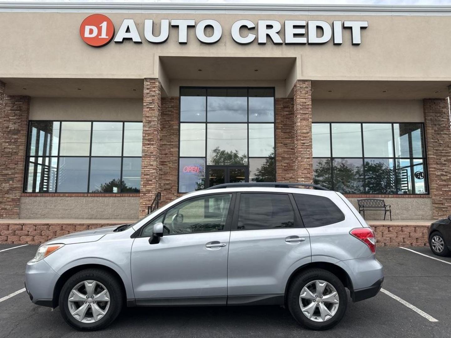 2015 Ice Silver Metallic /Gray Subaru Forester 2.5i Premium (JF2SJADC4FH) with an 2.5L 4-Cylinder DOHC 16V VVT engine, CVT transmission, located at 8595 Washington St., Thornton, CO, 80229, (303) 287-5511, 39.852348, -104.978447 - 2015 Subaru Forester<br><br>D1 Auto NEVER charges dealer fees! All cars have clean titles and have been inspected for mechanical issues. We have financing for everyone. Good credit, bad credit, first time buyers.<br>Clean CARFAX.<br>Please call Lakewood Location 303-274-7692 or Thornton 303-287-5511 - Photo#0