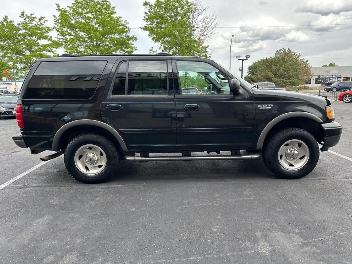 2001 Black Clearcoat /Gray Ford Expedition XLT (1FMFU16L41L) with an 5.4L SOHC engine, Automatic transmission, located at 8595 Washington St., Thornton, CO, 80229, (303) 287-5511, 39.852348, -104.978447 - 2001 Ford Expedition XLT 4X4<br><br>All Cars Have Clean Titles And Are Serviced Before Sale., Clean Carfax, No Accident, Non Smoker, No Pet Odor Or Hair, 5.4L SOHC, 4WD.<br><br>D1 Auto NEVER charges dealer fees! All cars have clean titles and have been inspected for mechanical issues. We have financ - Photo#4