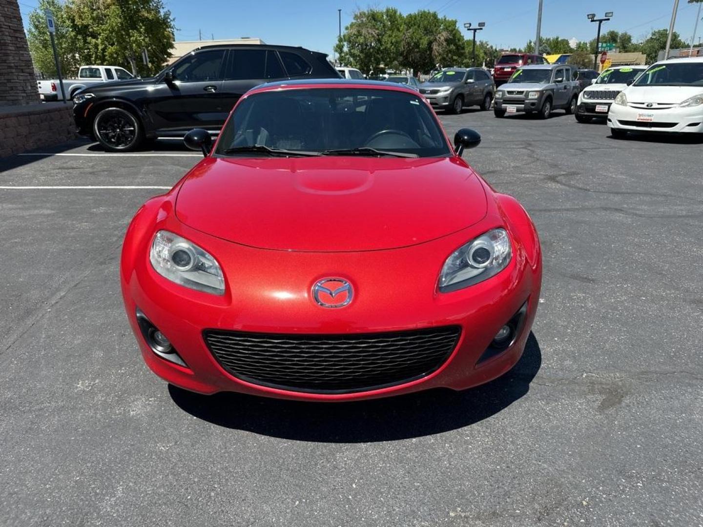 2012 Velocity Red Mica /Black Mazda Miata PRHT Special Edition (JM1NC2SF7C0) with an 2.0L I4 DOHC VVT 16V engine, Automatic transmission, located at 8595 Washington St., Thornton, CO, 80229, (303) 287-5511, 39.852348, -104.978447 - 2012 Mazda Miata Special Edition, Hard Top!! Only 31k Miles. Only 450 sold in the United States. Velocity Red Mica with retractible hard top convertible. <br><br>All Cars Have Clean Titles And Are Serviced Before Sale., Leather, Heated Seats, Bluetooth/ With Bluetooth Audio, Non Smoker, No Pet Odor - Photo#3