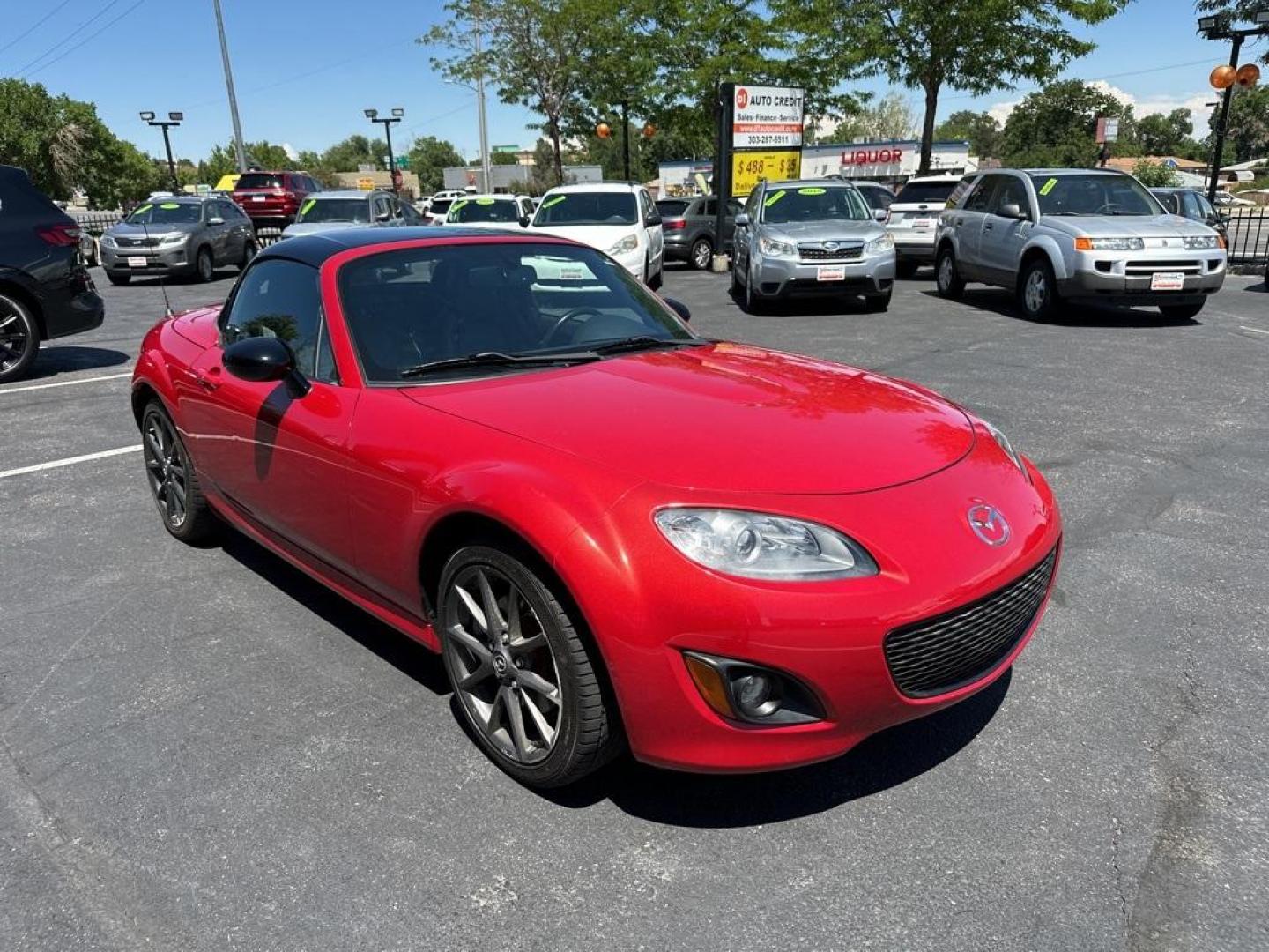 2012 Velocity Red Mica /Black Mazda Miata PRHT Special Edition (JM1NC2SF7C0) with an 2.0L I4 DOHC VVT 16V engine, Automatic transmission, located at 8595 Washington St., Thornton, CO, 80229, (303) 287-5511, 39.852348, -104.978447 - 2012 Mazda Miata Special Edition, Hard Top!! Only 31k Miles. Only 450 sold in the United States. Velocity Red Mica with retractible hard top convertible. <br><br>All Cars Have Clean Titles And Are Serviced Before Sale., Leather, Heated Seats, Bluetooth/ With Bluetooth Audio, Non Smoker, No Pet Odor - Photo#4