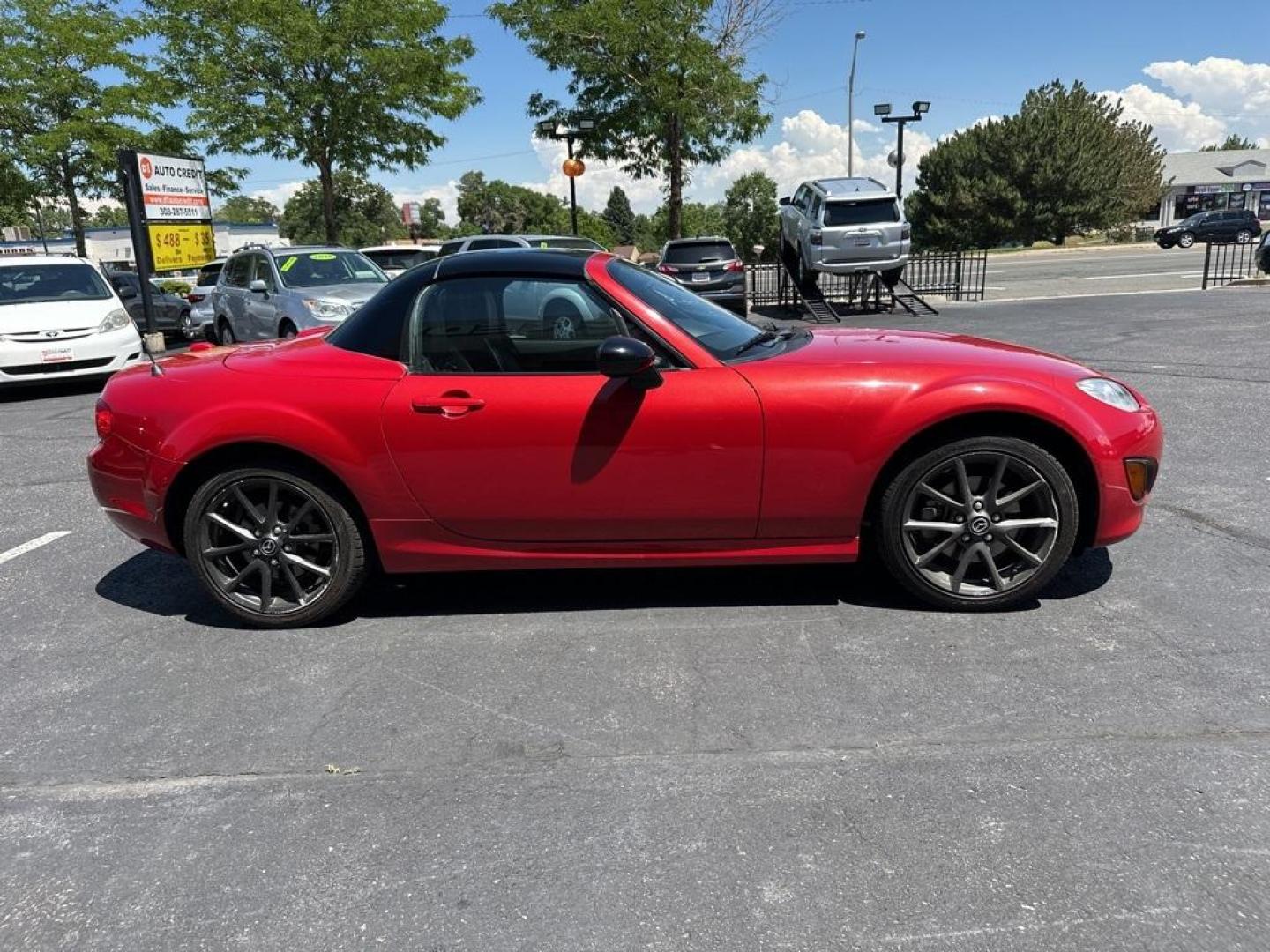 2012 Velocity Red Mica /Black Mazda Miata PRHT Special Edition (JM1NC2SF7C0) with an 2.0L I4 DOHC VVT 16V engine, Automatic transmission, located at 8595 Washington St., Thornton, CO, 80229, (303) 287-5511, 39.852348, -104.978447 - 2012 Mazda Miata Special Edition, Hard Top!! Only 31k Miles. Only 450 sold in the United States. Velocity Red Mica with retractible hard top convertible. <br><br>All Cars Have Clean Titles And Are Serviced Before Sale., Leather, Heated Seats, Bluetooth/ With Bluetooth Audio, Non Smoker, No Pet Odor - Photo#5