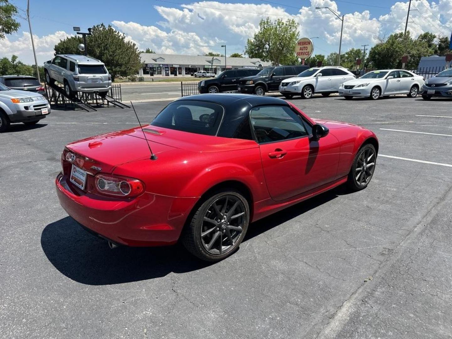 2012 Velocity Red Mica /Black Mazda Miata PRHT Special Edition (JM1NC2SF7C0) with an 2.0L I4 DOHC VVT 16V engine, Automatic transmission, located at 8595 Washington St., Thornton, CO, 80229, (303) 287-5511, 39.852348, -104.978447 - 2012 Mazda Miata Special Edition, Hard Top!! Only 31k Miles. Only 450 sold in the United States. Velocity Red Mica with retractible hard top convertible. <br><br>All Cars Have Clean Titles And Are Serviced Before Sale., Leather, Heated Seats, Bluetooth/ With Bluetooth Audio, Non Smoker, No Pet Odor - Photo#6