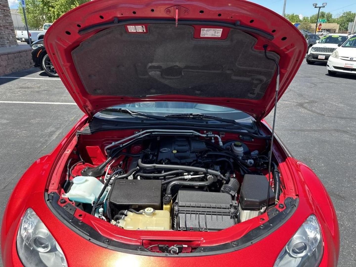 2012 Velocity Red Mica /Black Mazda Miata PRHT Special Edition (JM1NC2SF7C0) with an 2.0L I4 DOHC VVT 16V engine, Automatic transmission, located at 8595 Washington St., Thornton, CO, 80229, (303) 287-5511, 39.852348, -104.978447 - 2012 Mazda Miata Special Edition, Hard Top!! Only 31k Miles. Only 450 sold in the United States. Velocity Red Mica with retractible hard top convertible. <br><br>All Cars Have Clean Titles And Are Serviced Before Sale., Leather, Heated Seats, Bluetooth/ With Bluetooth Audio, Non Smoker, No Pet Odor - Photo#27