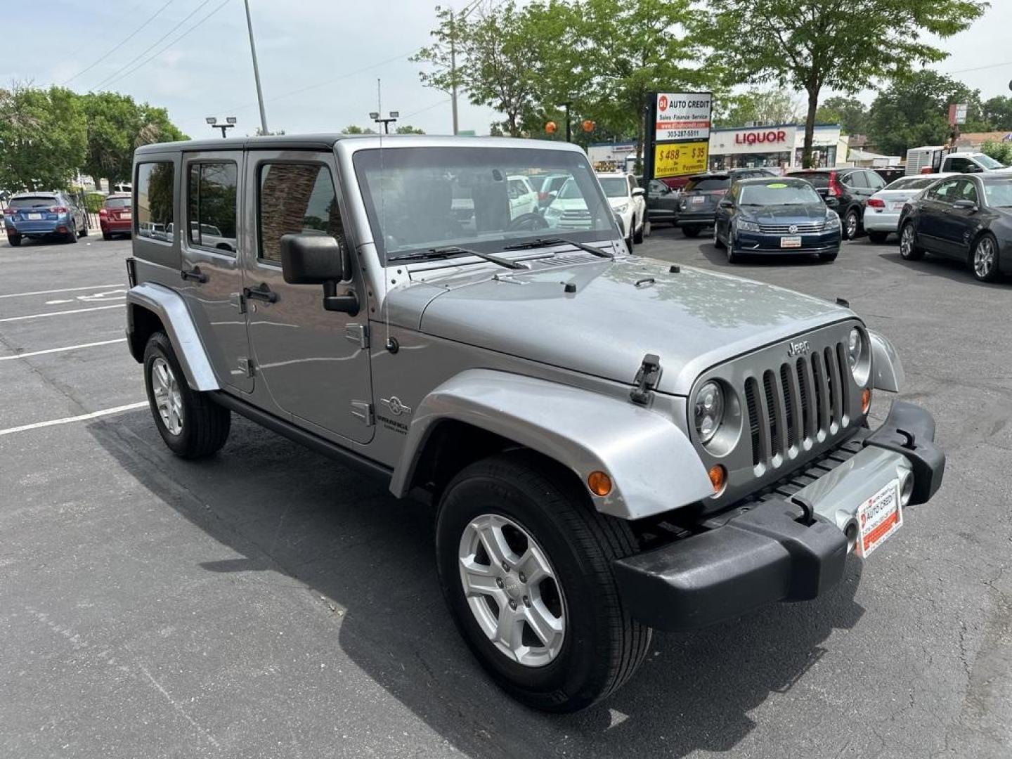 2013 Billet Metallic Clearcoat /Black Interior Jeep Wrangler Unlimited Freedom Edition (1C4BJWDG3DL) with an 3.6L V6 24V VVT engine, Automatic transmission, located at 8595 Washington St., Thornton, CO, 80229, (303) 287-5511, 39.852348, -104.978447 - 2013 Jeep Wrangler, Hard Top<br><br>All Cars Have Clean Titles And Are Serviced Before Sale., New Tires, Non Smoker, No Pet Odor Or Hair, Wrangler Unlimited Freedom Edition Hard Top, 4WD, Freedom Edition Package.<br><br>D1 Auto NEVER charges dealer fees! All cars have clean titles and have been insp - Photo#3