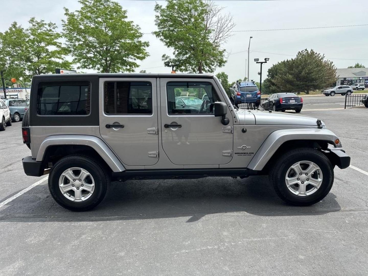 2013 Billet Metallic Clearcoat /Black Interior Jeep Wrangler Unlimited Freedom Edition (1C4BJWDG3DL) with an 3.6L V6 24V VVT engine, Automatic transmission, located at 8595 Washington St., Thornton, CO, 80229, (303) 287-5511, 39.852348, -104.978447 - 2013 Jeep Wrangler, Hard Top<br><br>All Cars Have Clean Titles And Are Serviced Before Sale., New Tires, Non Smoker, No Pet Odor Or Hair, Wrangler Unlimited Freedom Edition Hard Top, 4WD, Freedom Edition Package.<br><br>D1 Auto NEVER charges dealer fees! All cars have clean titles and have been insp - Photo#4