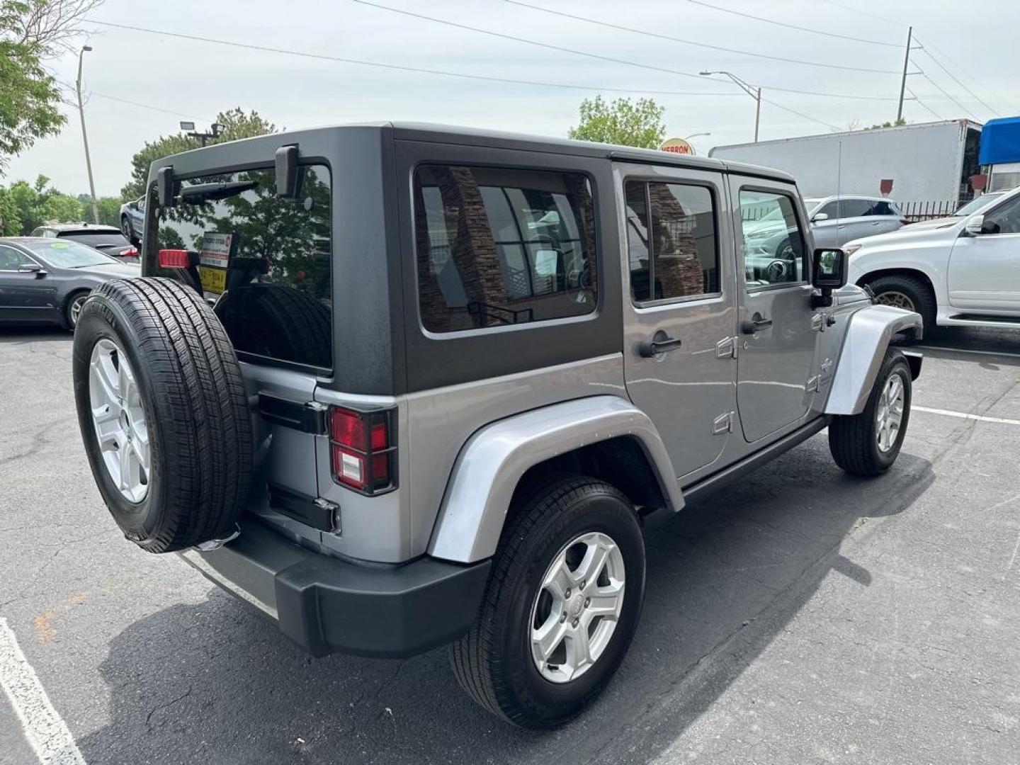 2013 Billet Metallic Clearcoat /Black Interior Jeep Wrangler Unlimited Freedom Edition (1C4BJWDG3DL) with an 3.6L V6 24V VVT engine, Automatic transmission, located at 8595 Washington St., Thornton, CO, 80229, (303) 287-5511, 39.852348, -104.978447 - 2013 Jeep Wrangler, Hard Top<br><br>All Cars Have Clean Titles And Are Serviced Before Sale., New Tires, Non Smoker, No Pet Odor Or Hair, Wrangler Unlimited Freedom Edition Hard Top, 4WD, Freedom Edition Package.<br><br>D1 Auto NEVER charges dealer fees! All cars have clean titles and have been insp - Photo#5