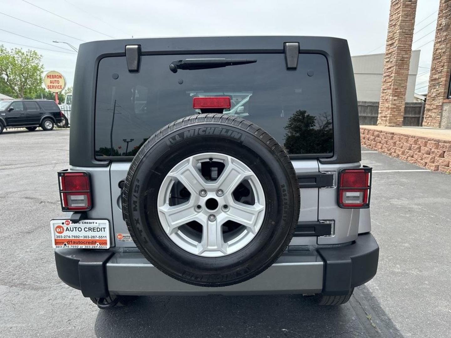 2013 Billet Metallic Clearcoat /Black Interior Jeep Wrangler Unlimited Freedom Edition (1C4BJWDG3DL) with an 3.6L V6 24V VVT engine, Automatic transmission, located at 8595 Washington St., Thornton, CO, 80229, (303) 287-5511, 39.852348, -104.978447 - 2013 Jeep Wrangler, Hard Top<br><br>All Cars Have Clean Titles And Are Serviced Before Sale., New Tires, Non Smoker, No Pet Odor Or Hair, Wrangler Unlimited Freedom Edition Hard Top, 4WD, Freedom Edition Package.<br><br>D1 Auto NEVER charges dealer fees! All cars have clean titles and have been insp - Photo#6