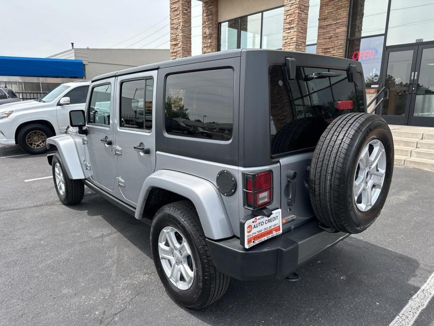 2013 Billet Metallic Clearcoat /Black Interior Jeep Wrangler Unlimited Freedom Edition (1C4BJWDG3DL) with an 3.6L V6 24V VVT engine, Automatic transmission, located at 8595 Washington St., Thornton, CO, 80229, (303) 287-5511, 39.852348, -104.978447 - 2013 Jeep Wrangler, Hard Top<br><br>All Cars Have Clean Titles And Are Serviced Before Sale., New Tires, Non Smoker, No Pet Odor Or Hair, Wrangler Unlimited Freedom Edition Hard Top, 4WD, Freedom Edition Package.<br><br>D1 Auto NEVER charges dealer fees! All cars have clean titles and have been insp - Photo#7