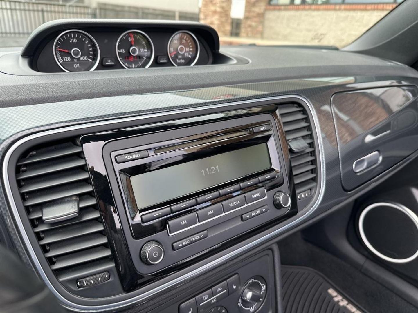 2015 Platinum Gray Metallic/Black Roof /Black Quartz Volkswagen Beetle 2.0T R-Line (3VW7S7AT4FM) with an 2.0L TSI 210 hp engine, Automatic transmission, located at 8595 Washington St., Thornton, CO, 80229, (303) 287-5511, 39.852348, -104.978447 - 2015 Volkswagen Beetle Convertible In unbelievable condition. This car shows absoulutley no signs of wear and has all its accessories. Fully serviced, new brakes, new tires. Very fun and fast. No accidents.<br>All Cars Have Clean Titles And Are Serviced Before Sale., Clean Carfax, No Accident, All B - Photo#19