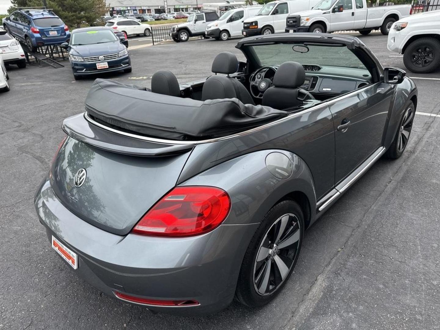 2015 Platinum Gray Metallic/Black Roof /Black Quartz Volkswagen Beetle 2.0T R-Line (3VW7S7AT4FM) with an 2.0L TSI 210 hp engine, Automatic transmission, located at 8595 Washington St., Thornton, CO, 80229, (303) 287-5511, 39.852348, -104.978447 - 2015 Volkswagen Beetle Convertible In unbelievable condition. This car shows absoulutley no signs of wear and has all its accessories. Fully serviced, new brakes, new tires. Very fun and fast. No accidents.<br>All Cars Have Clean Titles And Are Serviced Before Sale., Clean Carfax, No Accident, All B - Photo#6