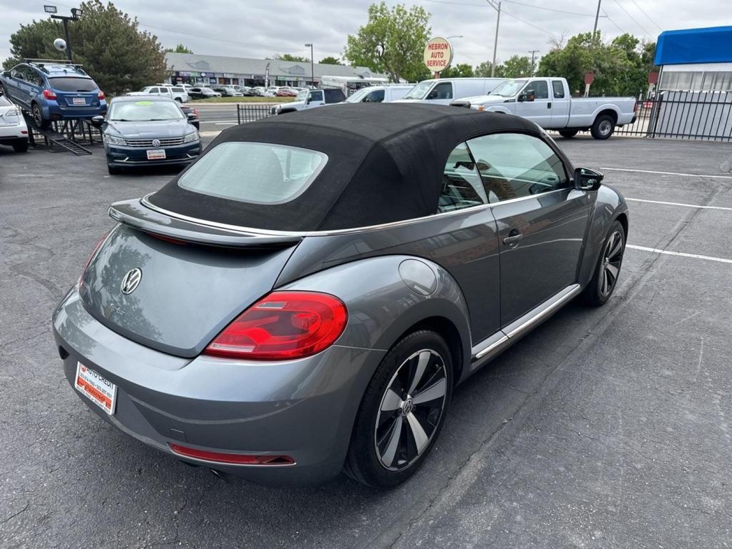 2015 Platinum Gray Metallic/Black Roof /Black Quartz Volkswagen Beetle 2.0T R-Line (3VW7S7AT4FM) with an 2.0L TSI 210 hp engine, Automatic transmission, located at 8595 Washington St., Thornton, CO, 80229, (303) 287-5511, 39.852348, -104.978447 - 2015 Volkswagen Beetle Convertible In unbelievable condition. This car shows absoulutley no signs of wear and has all its accessories. Fully serviced, new brakes, new tires. Very fun and fast. No accidents.<br>All Cars Have Clean Titles And Are Serviced Before Sale., Clean Carfax, No Accident, All B - Photo#8