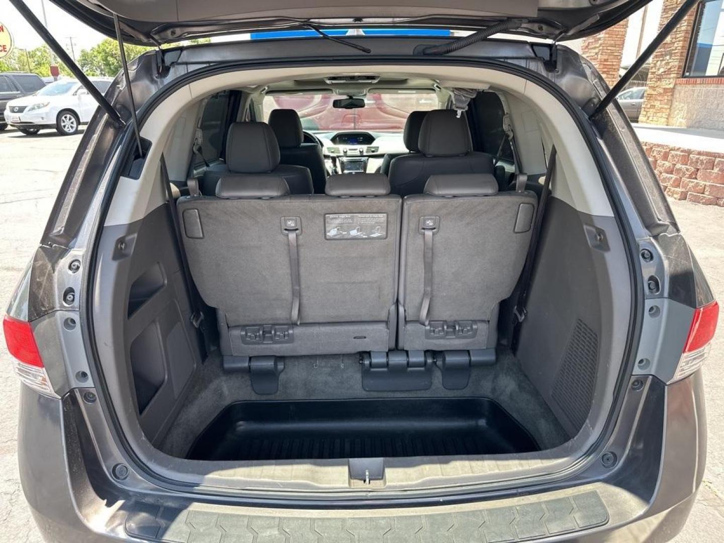 2016 Modern Steel Metallic /Gray Honda Odyssey EX-L (5FNRL5H61GB) with an 3.5L V6 SOHC i-VTEC 24V engine, Automatic transmission, located at 8595 Washington St., Thornton, CO, 80229, (303) 287-5511, 39.852348, -104.978447 - 2016 Honda Odyssey EX-L With DVD. One owner with lots of service records on Carfax including Timing Belt Service.<br><br>All Cars Have Clean Titles And Are Serviced Before Sale., Blind Spot Monitoring, Backup Camera, Leather, Heated Seats, Non Smoker, No Pet Odor Or Hair, Odyssey EX-L DVD, FWD, A/V - Photo#17