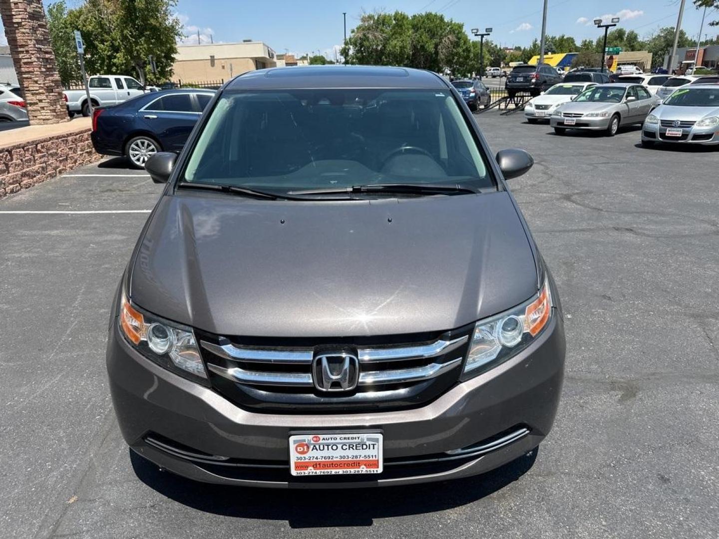 2016 Modern Steel Metallic /Gray Honda Odyssey EX-L (5FNRL5H61GB) with an 3.5L V6 SOHC i-VTEC 24V engine, Automatic transmission, located at 8595 Washington St., Thornton, CO, 80229, (303) 287-5511, 39.852348, -104.978447 - 2016 Honda Odyssey EX-L With DVD. One owner with lots of service records on Carfax including Timing Belt Service.<br><br>All Cars Have Clean Titles And Are Serviced Before Sale., Blind Spot Monitoring, Backup Camera, Leather, Heated Seats, Non Smoker, No Pet Odor Or Hair, Odyssey EX-L DVD, FWD, A/V - Photo#2