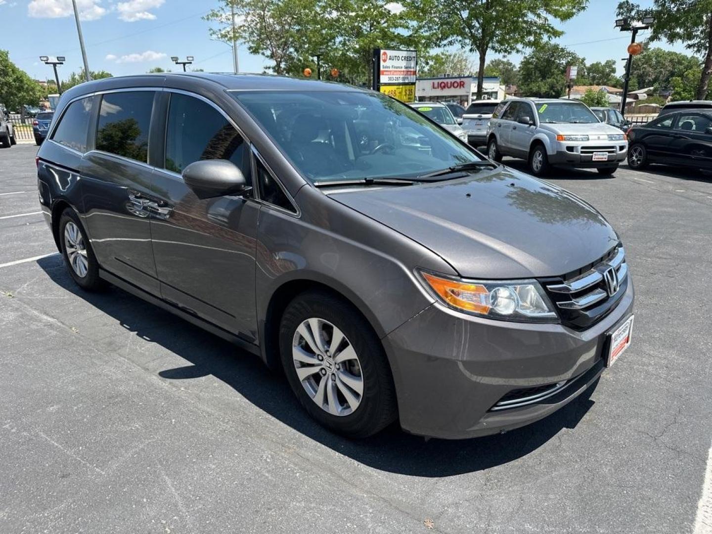 2016 Modern Steel Metallic /Gray Honda Odyssey EX-L (5FNRL5H61GB) with an 3.5L V6 SOHC i-VTEC 24V engine, Automatic transmission, located at 8595 Washington St., Thornton, CO, 80229, (303) 287-5511, 39.852348, -104.978447 - 2016 Honda Odyssey EX-L With DVD. One owner with lots of service records on Carfax including Timing Belt Service.<br><br>All Cars Have Clean Titles And Are Serviced Before Sale., Blind Spot Monitoring, Backup Camera, Leather, Heated Seats, Non Smoker, No Pet Odor Or Hair, Odyssey EX-L DVD, FWD, A/V - Photo#3