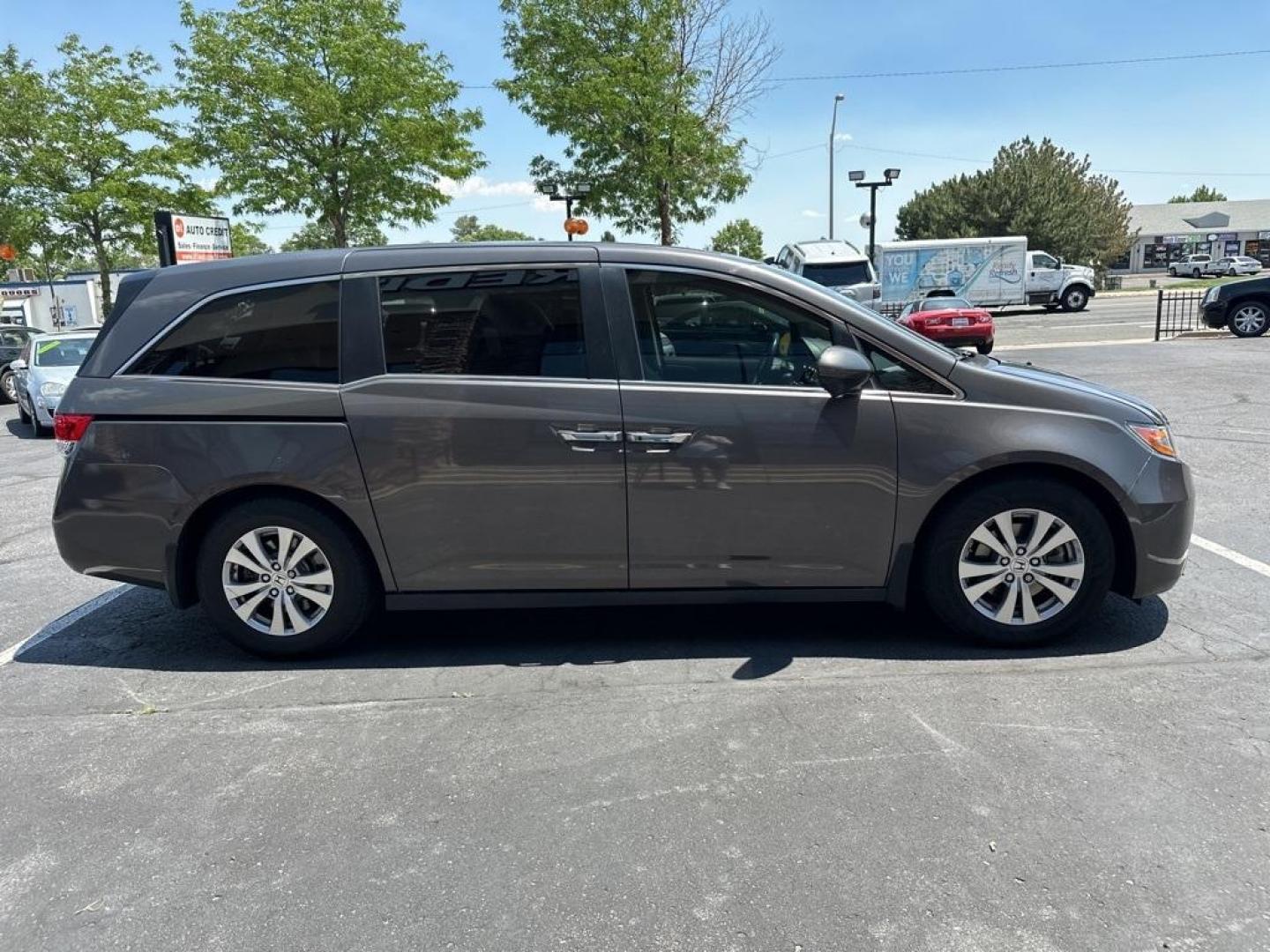 2016 Modern Steel Metallic /Gray Honda Odyssey EX-L (5FNRL5H61GB) with an 3.5L V6 SOHC i-VTEC 24V engine, Automatic transmission, located at 8595 Washington St., Thornton, CO, 80229, (303) 287-5511, 39.852348, -104.978447 - 2016 Honda Odyssey EX-L With DVD. One owner with lots of service records on Carfax including Timing Belt Service.<br><br>All Cars Have Clean Titles And Are Serviced Before Sale., Blind Spot Monitoring, Backup Camera, Leather, Heated Seats, Non Smoker, No Pet Odor Or Hair, Odyssey EX-L DVD, FWD, A/V - Photo#4