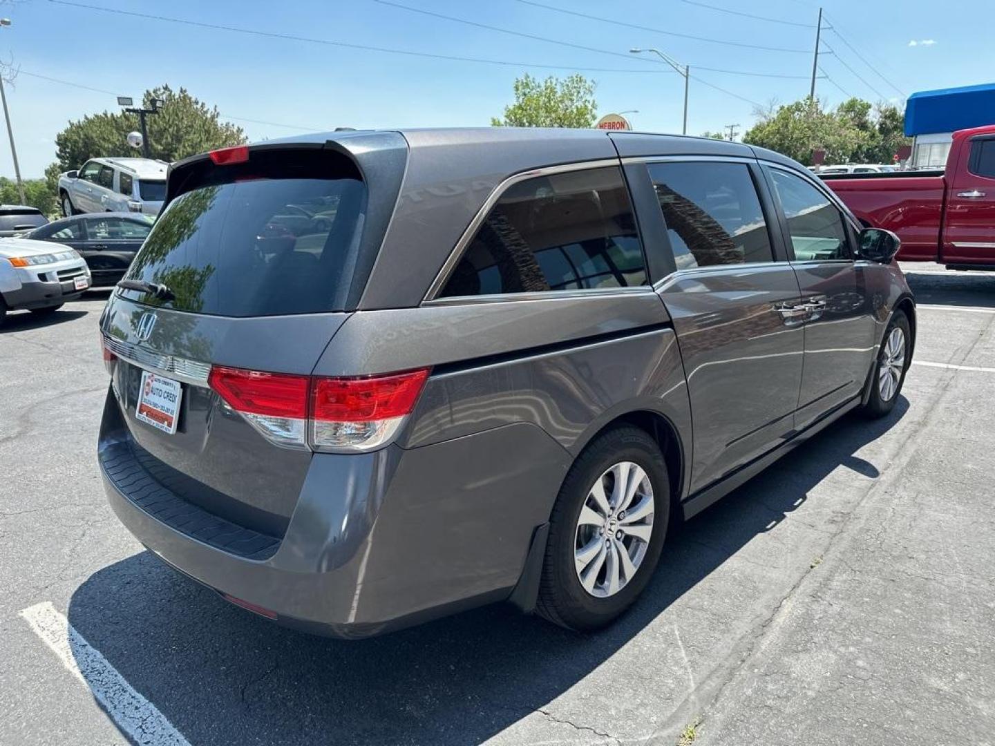 2016 Modern Steel Metallic /Gray Honda Odyssey EX-L (5FNRL5H61GB) with an 3.5L V6 SOHC i-VTEC 24V engine, Automatic transmission, located at 8595 Washington St., Thornton, CO, 80229, (303) 287-5511, 39.852348, -104.978447 - 2016 Honda Odyssey EX-L With DVD. One owner with lots of service records on Carfax including Timing Belt Service.<br><br>All Cars Have Clean Titles And Are Serviced Before Sale., Blind Spot Monitoring, Backup Camera, Leather, Heated Seats, Non Smoker, No Pet Odor Or Hair, Odyssey EX-L DVD, FWD, A/V - Photo#5