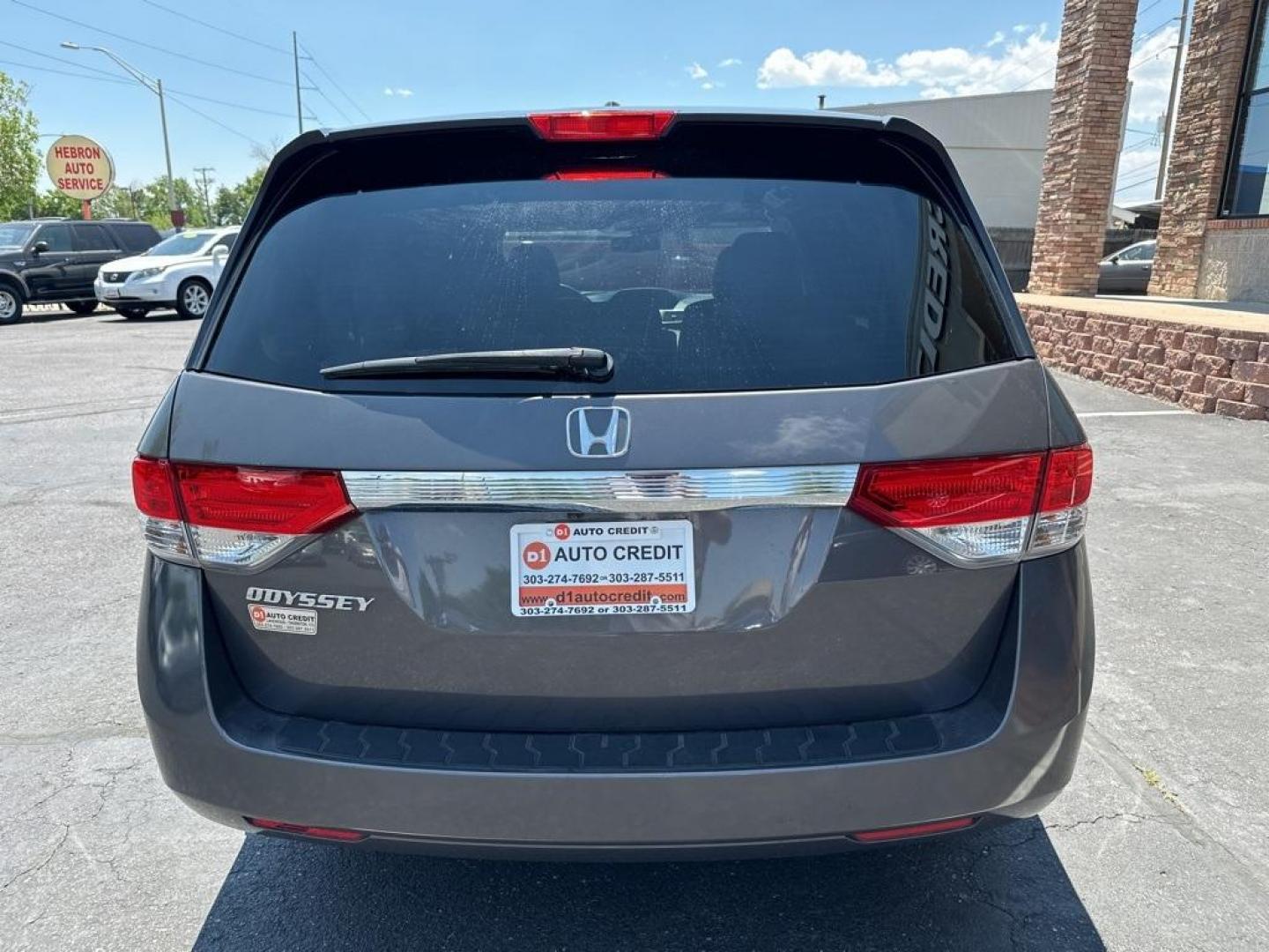 2016 Modern Steel Metallic /Gray Honda Odyssey EX-L (5FNRL5H61GB) with an 3.5L V6 SOHC i-VTEC 24V engine, Automatic transmission, located at 8595 Washington St., Thornton, CO, 80229, (303) 287-5511, 39.852348, -104.978447 - 2016 Honda Odyssey EX-L With DVD. One owner with lots of service records on Carfax including Timing Belt Service.<br><br>All Cars Have Clean Titles And Are Serviced Before Sale., Blind Spot Monitoring, Backup Camera, Leather, Heated Seats, Non Smoker, No Pet Odor Or Hair, Odyssey EX-L DVD, FWD, A/V - Photo#6