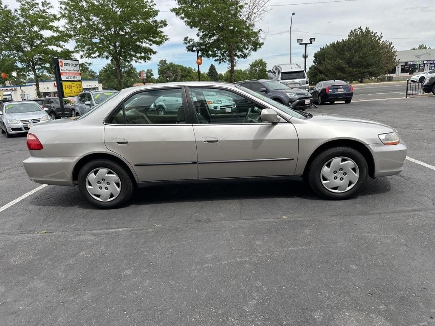 1999 Satin Silver Metallic /tan Honda Accord LX (1HGCG1642XA) with an 3.0L V6 SMPI engine, Automatic transmission, located at 8595 Washington St., Thornton, CO, 80229, (303) 287-5511, 39.852348, -104.978447 - 1999 Honda Accord<br><br>D1 Auto NEVER charges dealer fees! All cars have clean titles and have been inspected for mechanical issues. We have financing for everyone. Good credit, bad credit, first time buyers.<br>CARFAX One-Owner.<br>Please call Lakewood Location 303-274-7692 or Thornton 303-287-551 - Photo#4