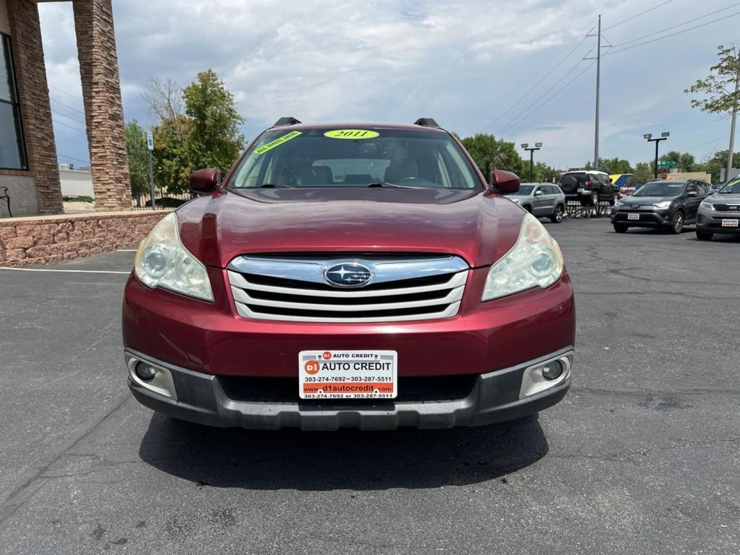 2011 Ruby Red Pearl /Ivory Subaru Outback 2.5i Premium (4S4BRBFC8B3) with an 2.5L 4-Cylinder engine, CVT transmission, located at 8595 Washington St., Thornton, CO, 80229, (303) 287-5511, 39.852348, -104.978447 - 2011 Subaru Outback<br><br>D1 Auto NEVER charges dealer fees! All cars have clean titles and have been inspected for mechanical issues. We have financing for everyone. Good credit, bad credit, first time buyers.<br>CARFAX One-Owner. Clean CARFAX. Odometer is 4040 miles below market average!<br>Pleas - Photo#2