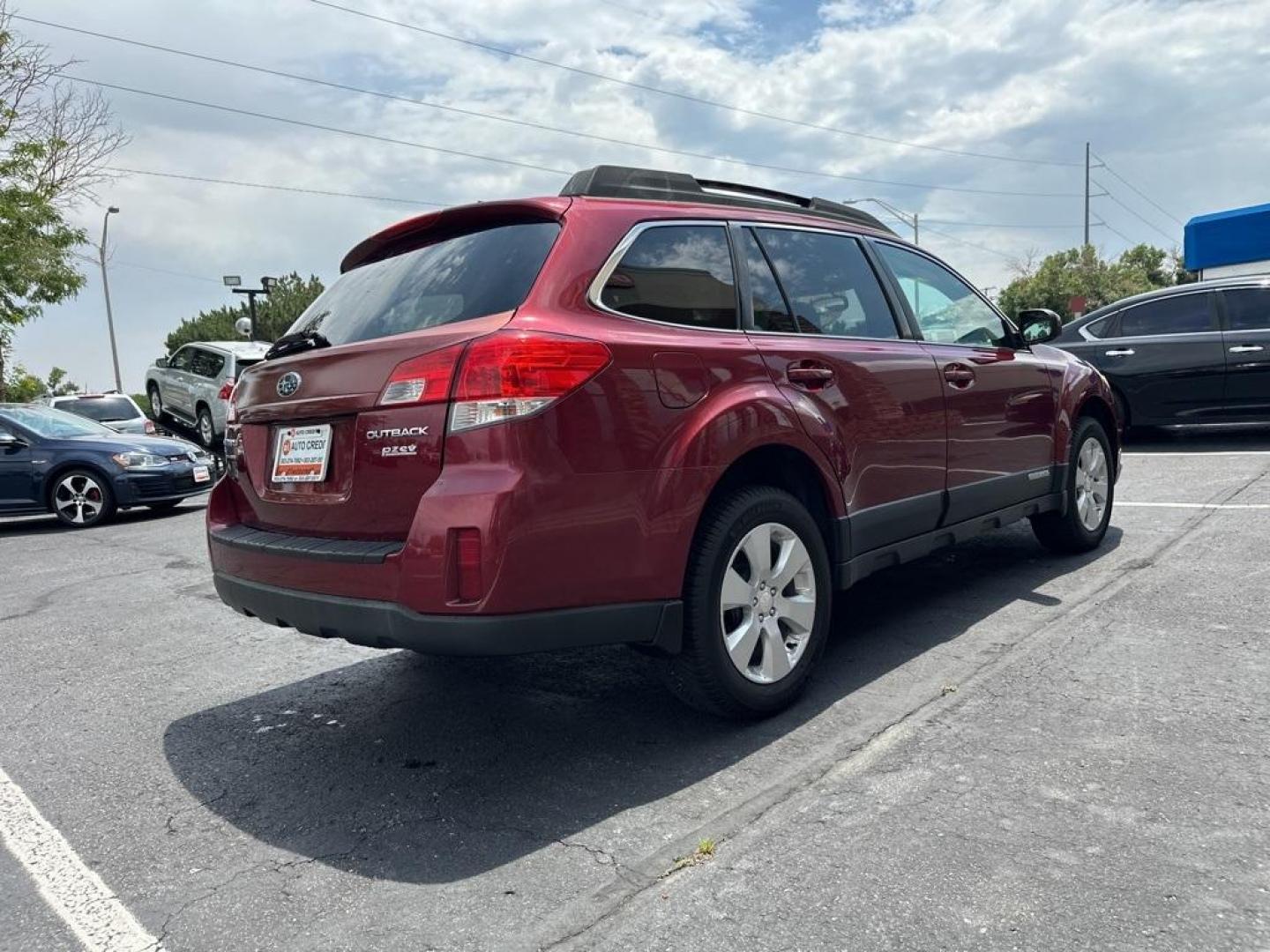 2011 Ruby Red Pearl /Ivory Subaru Outback 2.5i Premium (4S4BRBFC8B3) with an 2.5L 4-Cylinder engine, CVT transmission, located at 8595 Washington St., Thornton, CO, 80229, (303) 287-5511, 39.852348, -104.978447 - 2011 Subaru Outback<br><br>D1 Auto NEVER charges dealer fees! All cars have clean titles and have been inspected for mechanical issues. We have financing for everyone. Good credit, bad credit, first time buyers.<br>CARFAX One-Owner. Clean CARFAX. Odometer is 4040 miles below market average!<br>Pleas - Photo#5