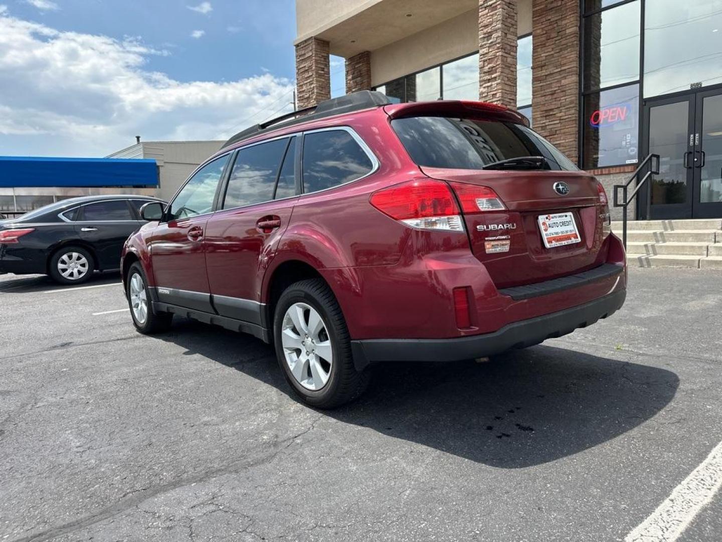 2011 Ruby Red Pearl /Ivory Subaru Outback 2.5i Premium (4S4BRBFC8B3) with an 2.5L 4-Cylinder engine, CVT transmission, located at 8595 Washington St., Thornton, CO, 80229, (303) 287-5511, 39.852348, -104.978447 - 2011 Subaru Outback<br><br>D1 Auto NEVER charges dealer fees! All cars have clean titles and have been inspected for mechanical issues. We have financing for everyone. Good credit, bad credit, first time buyers.<br>CARFAX One-Owner. Clean CARFAX. Odometer is 4040 miles below market average!<br>Pleas - Photo#7