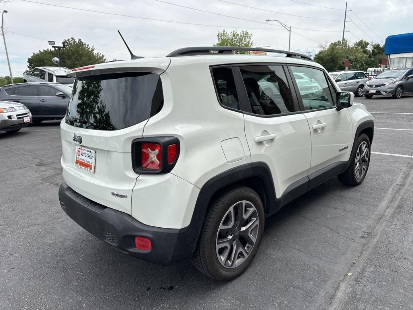 2015 Alpine White /Black Jeep Renegade Latitude (ZACCJABT4FP) with an 2.4L I4 MultiAir engine, Automatic transmission, located at 8595 Washington St., Thornton, CO, 80229, (303) 287-5511, 39.852348, -104.978447 - 2015 Jeep Renegade<br><br>D1 Auto NEVER charges dealer fees! All cars have clean titles and have been inspected for mechanical issues. We have financing for everyone. Good credit, bad credit, first time buyers.<br><br>Please call Lakewood Location 303-274-7692 or Thornton 303-287-5511 to schedule a - Photo#5