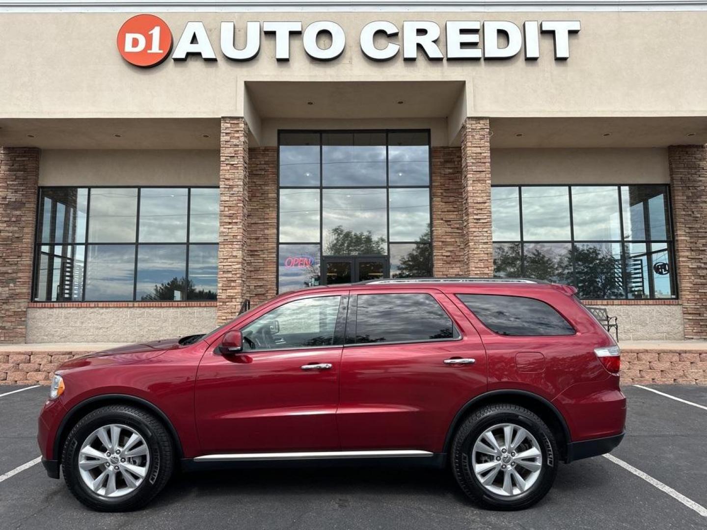 2013 Deep Cherry Red Crystal Pearlcoat /Dark Graystone/Medium Graystone Interior Dodge Durango Crew (1C4RDJDG6DC) with an 3.6L V6 Flex Fuel 24V VVT engine, Automatic transmission, located at 8595 Washington St., Thornton, CO, 80229, (303) 287-5511, 39.852348, -104.978447 - 2013 Dodge Durango<br><br>D1 Auto NEVER charges dealer fees! All cars have clean titles and have been inspected for mechanical issues. We have financing for everyone. Good credit, bad credit, first time buyers.<br><br>Please call Lakewood Location 303-274-7692 or Thornton 303-287-5511 to schedule a - Photo#0