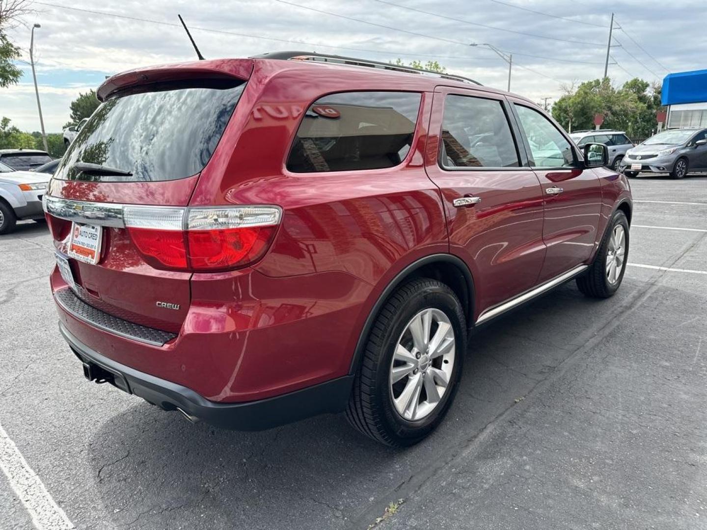 2013 Deep Cherry Red Crystal Pearlcoat /Dark Graystone/Medium Graystone Interior Dodge Durango Crew (1C4RDJDG6DC) with an 3.6L V6 Flex Fuel 24V VVT engine, Automatic transmission, located at 8595 Washington St., Thornton, CO, 80229, (303) 287-5511, 39.852348, -104.978447 - 2013 Dodge Durango<br><br>D1 Auto NEVER charges dealer fees! All cars have clean titles and have been inspected for mechanical issues. We have financing for everyone. Good credit, bad credit, first time buyers.<br><br>Please call Lakewood Location 303-274-7692 or Thornton 303-287-5511 to schedule a - Photo#5