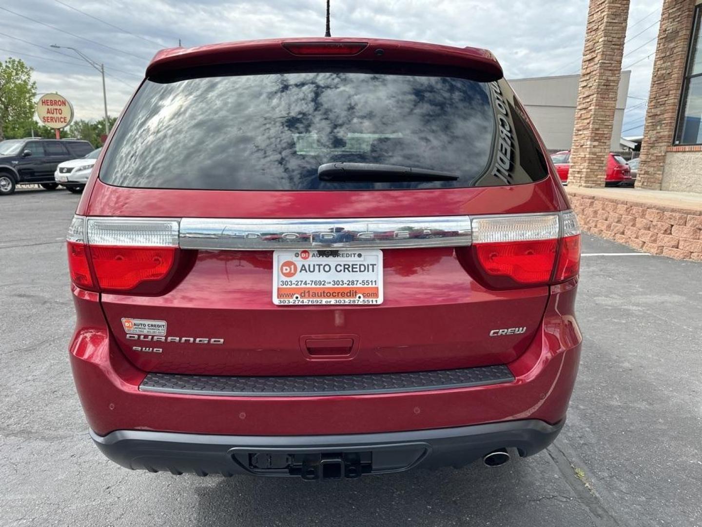 2013 Deep Cherry Red Crystal Pearlcoat /Dark Graystone/Medium Graystone Interior Dodge Durango Crew (1C4RDJDG6DC) with an 3.6L V6 Flex Fuel 24V VVT engine, Automatic transmission, located at 8595 Washington St., Thornton, CO, 80229, (303) 287-5511, 39.852348, -104.978447 - 2013 Dodge Durango<br><br>D1 Auto NEVER charges dealer fees! All cars have clean titles and have been inspected for mechanical issues. We have financing for everyone. Good credit, bad credit, first time buyers.<br><br>Please call Lakewood Location 303-274-7692 or Thornton 303-287-5511 to schedule a - Photo#6