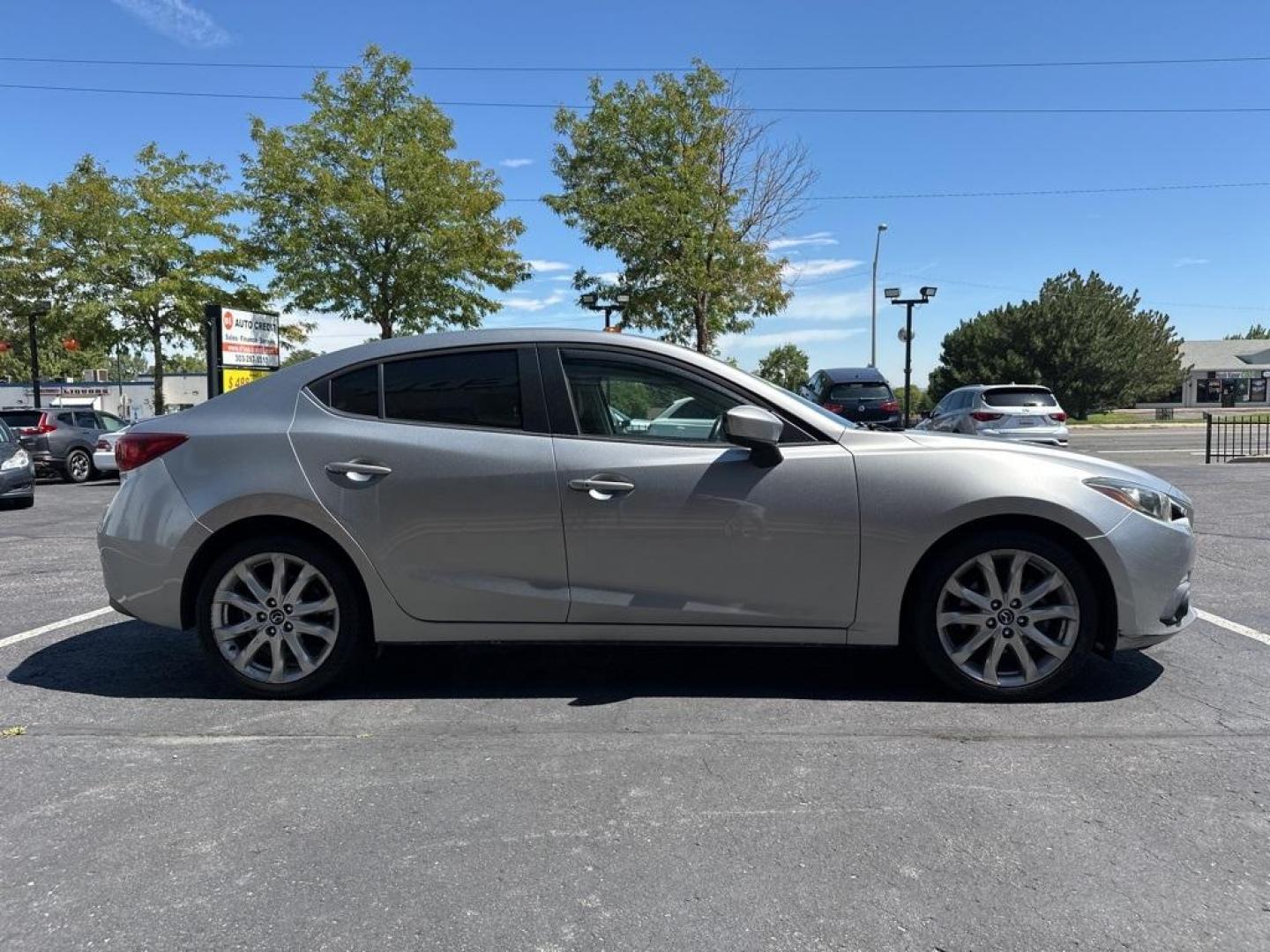 2015 Liquid Silver Metallic /Black Mazda Mazda3 s Touring (JM1BM1V30F1) with an SKYACTIV 2.5L 4-Cylinder DOHC 16V engine, Automatic transmission, located at 8595 Washington St., Thornton, CO, 80229, (303) 287-5511, 39.852348, -104.978447 - 2015 Mazda Mazda3<br><br>D1 Auto NEVER charges dealer fees! All cars have clean titles and have been inspected for mechanical issues. We have financing for everyone. Good credit, bad credit, first time buyers.<br><br>Please call Lakewood Location 303-274-7692 or Thornton 303-287-5511 to schedule a t - Photo#4