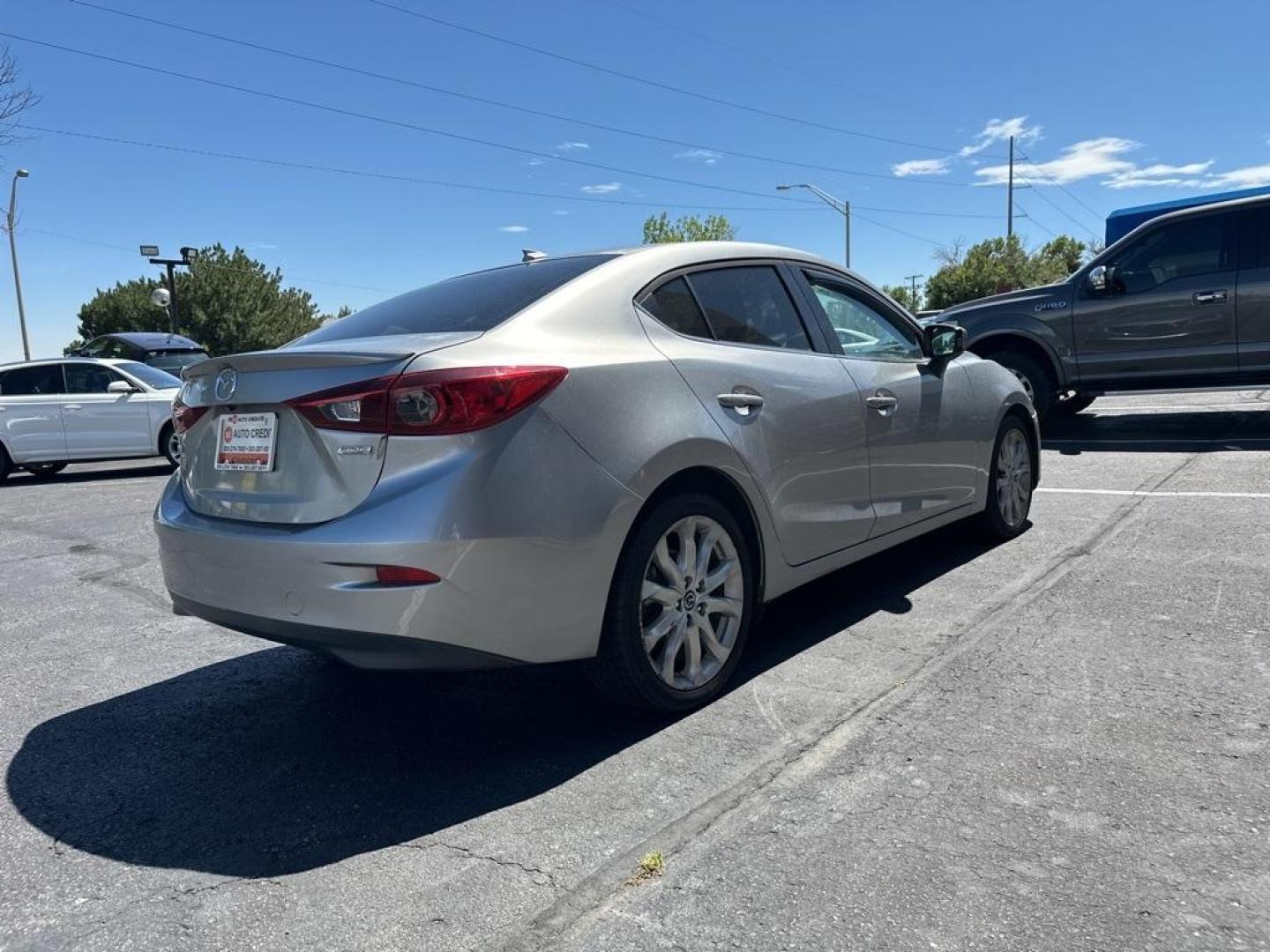 2015 Liquid Silver Metallic /Black Mazda Mazda3 s Touring (JM1BM1V30F1) with an SKYACTIV 2.5L 4-Cylinder DOHC 16V engine, Automatic transmission, located at 8595 Washington St., Thornton, CO, 80229, (303) 287-5511, 39.852348, -104.978447 - 2015 Mazda Mazda3<br><br>D1 Auto NEVER charges dealer fees! All cars have clean titles and have been inspected for mechanical issues. We have financing for everyone. Good credit, bad credit, first time buyers.<br><br>Please call Lakewood Location 303-274-7692 or Thornton 303-287-5511 to schedule a t - Photo#5