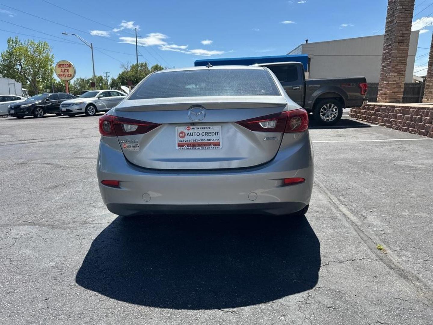 2015 Liquid Silver Metallic /Black Mazda Mazda3 s Touring (JM1BM1V30F1) with an SKYACTIV 2.5L 4-Cylinder DOHC 16V engine, Automatic transmission, located at 8595 Washington St., Thornton, CO, 80229, (303) 287-5511, 39.852348, -104.978447 - 2015 Mazda Mazda3<br><br>D1 Auto NEVER charges dealer fees! All cars have clean titles and have been inspected for mechanical issues. We have financing for everyone. Good credit, bad credit, first time buyers.<br><br>Please call Lakewood Location 303-274-7692 or Thornton 303-287-5511 to schedule a t - Photo#6